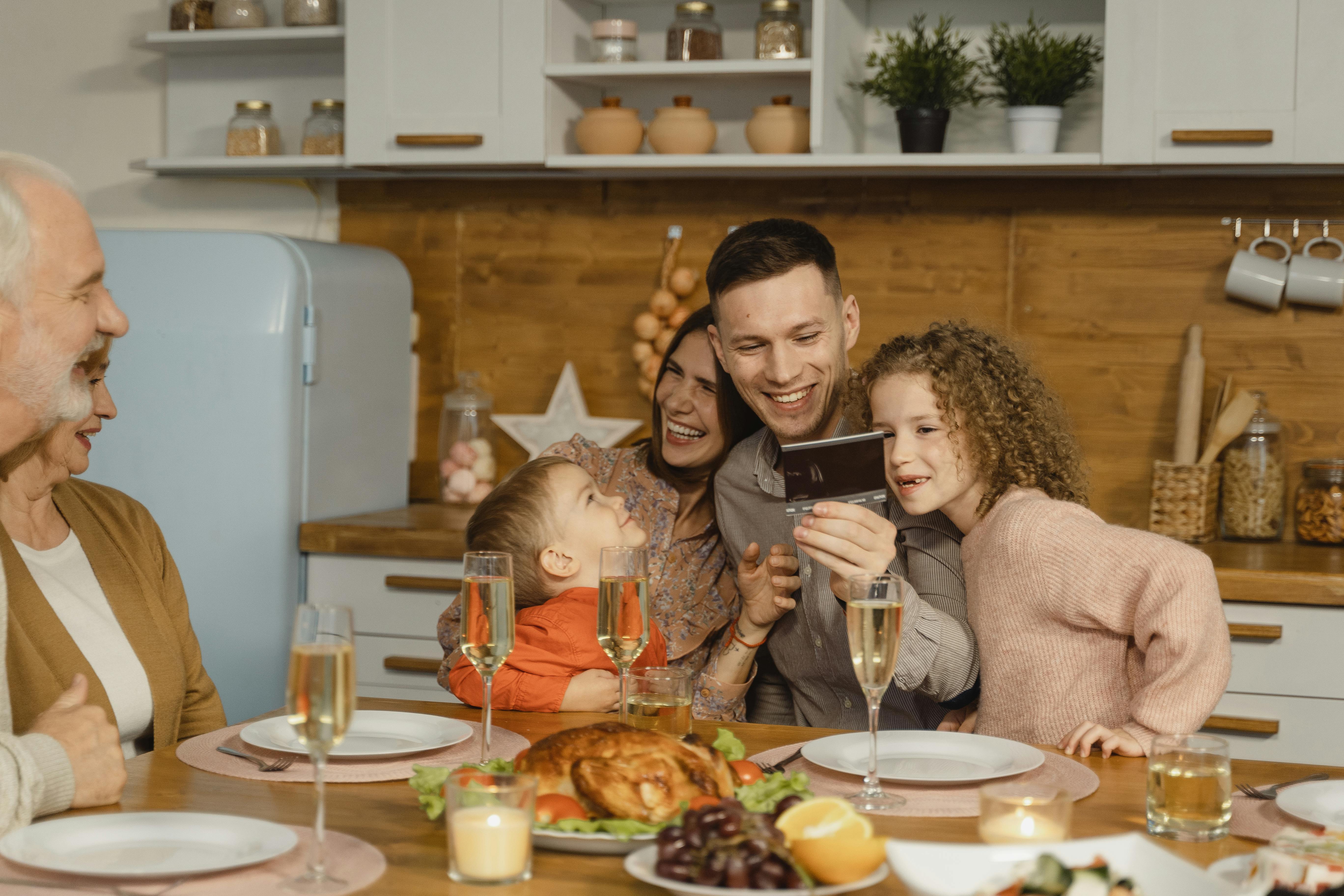 A complete family sharing a meal together | Source: Pexels