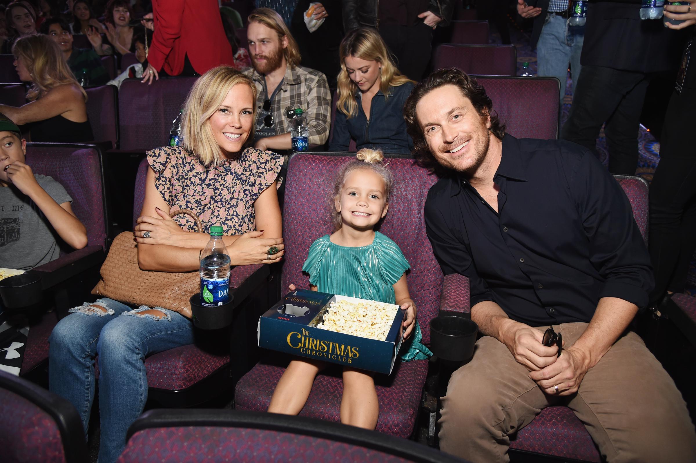 "At The Christmas Chronicles" premiere in 2018, Rio Hudson sat between her parents, Erinn Bartlett and Oliver Hudson, sharing smiles inside the theater. Clutching a box of popcorn, Rio looked right at home, enjoying a festive night out with her family.