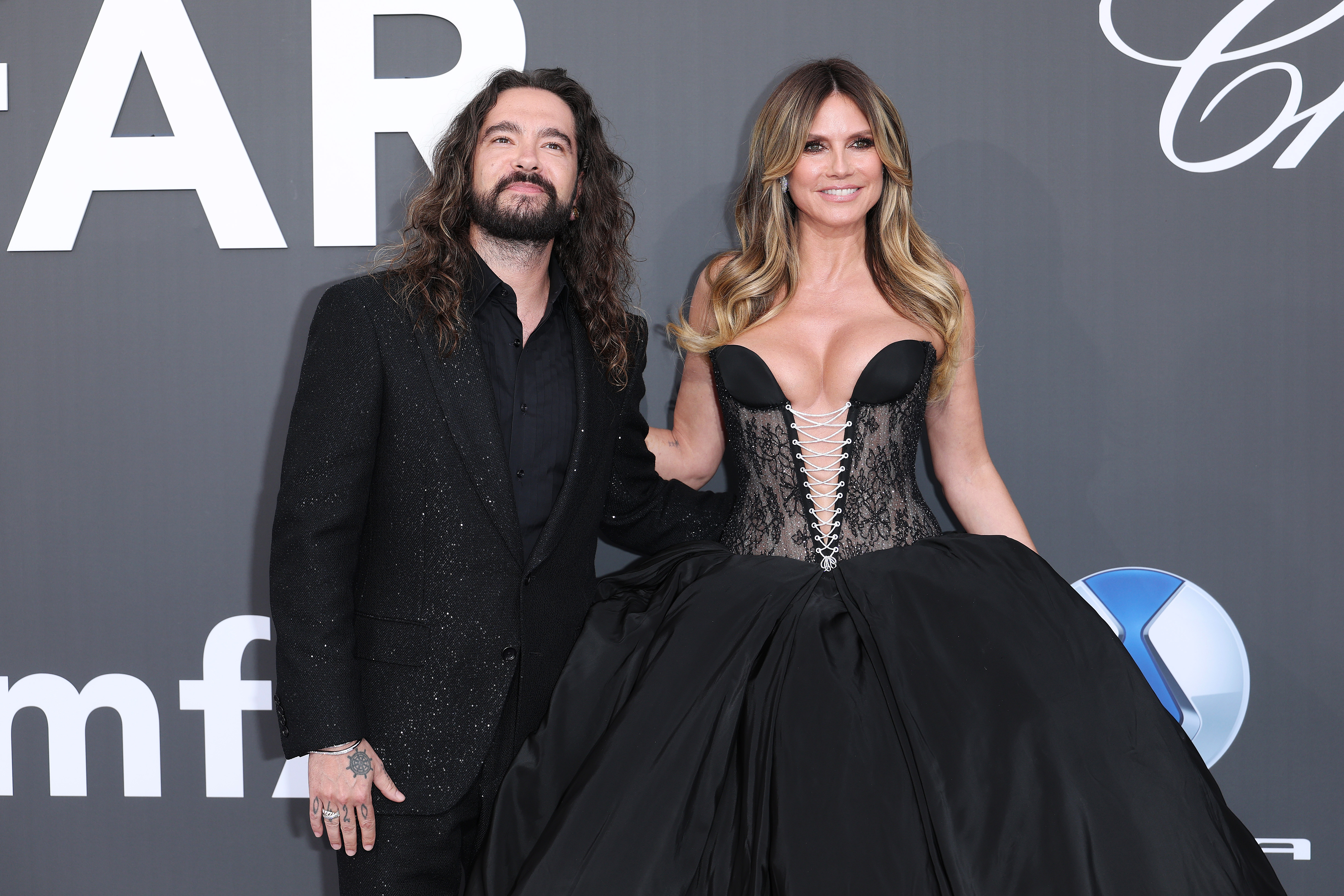 Heidi Klum and Tom Kaulitz pose side by side, their close bond reflecting the deeper connection Klum says comes from shared roots, values, and understanding. | Source: Getty Images