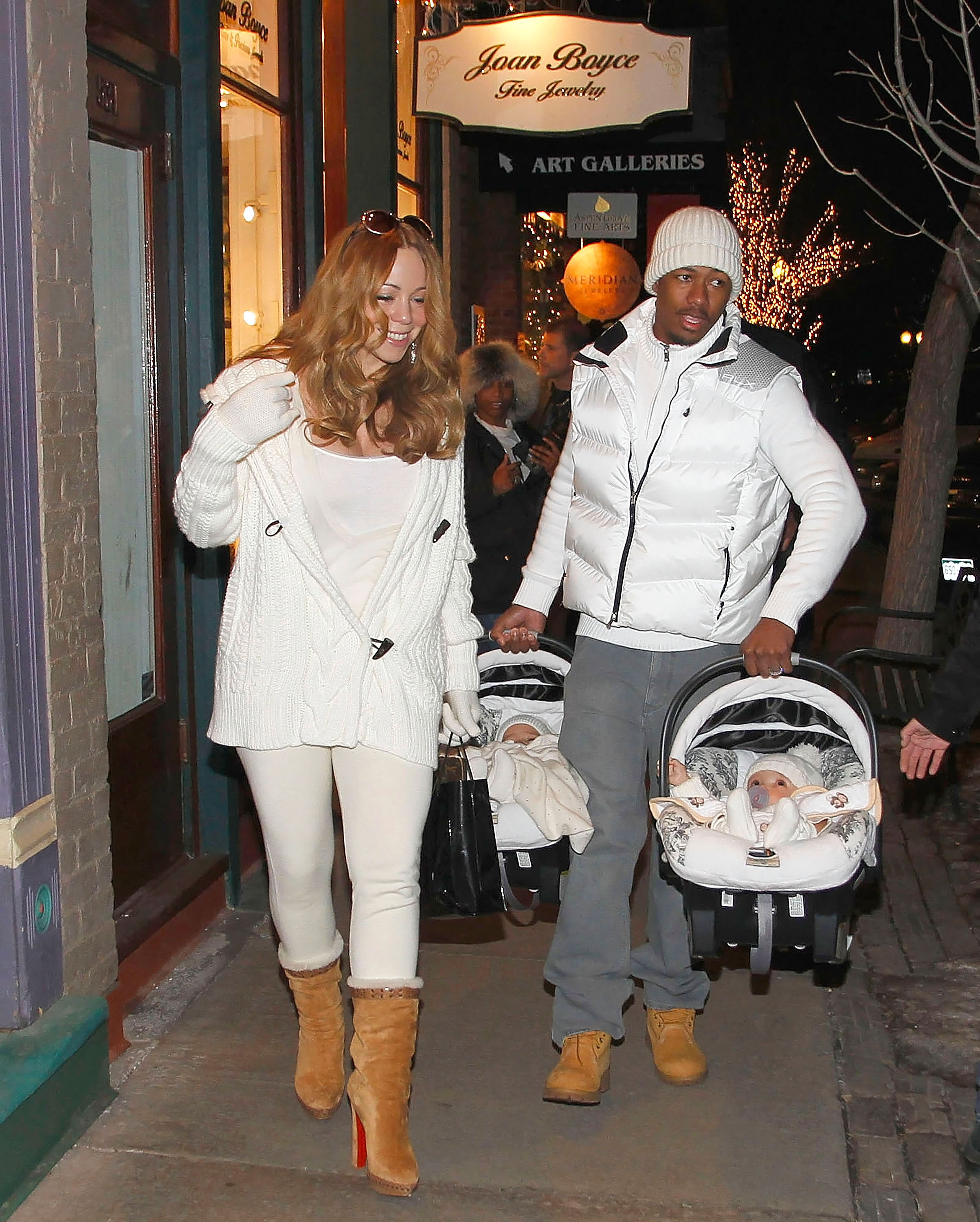 Mariah Carey and Nick Cannon are seen out with their twins, Moroccan Scott Cannon and Monroe Cannon, as they carry them in car seats through the streets of Aspen, Colorado, on December 31, 2011.