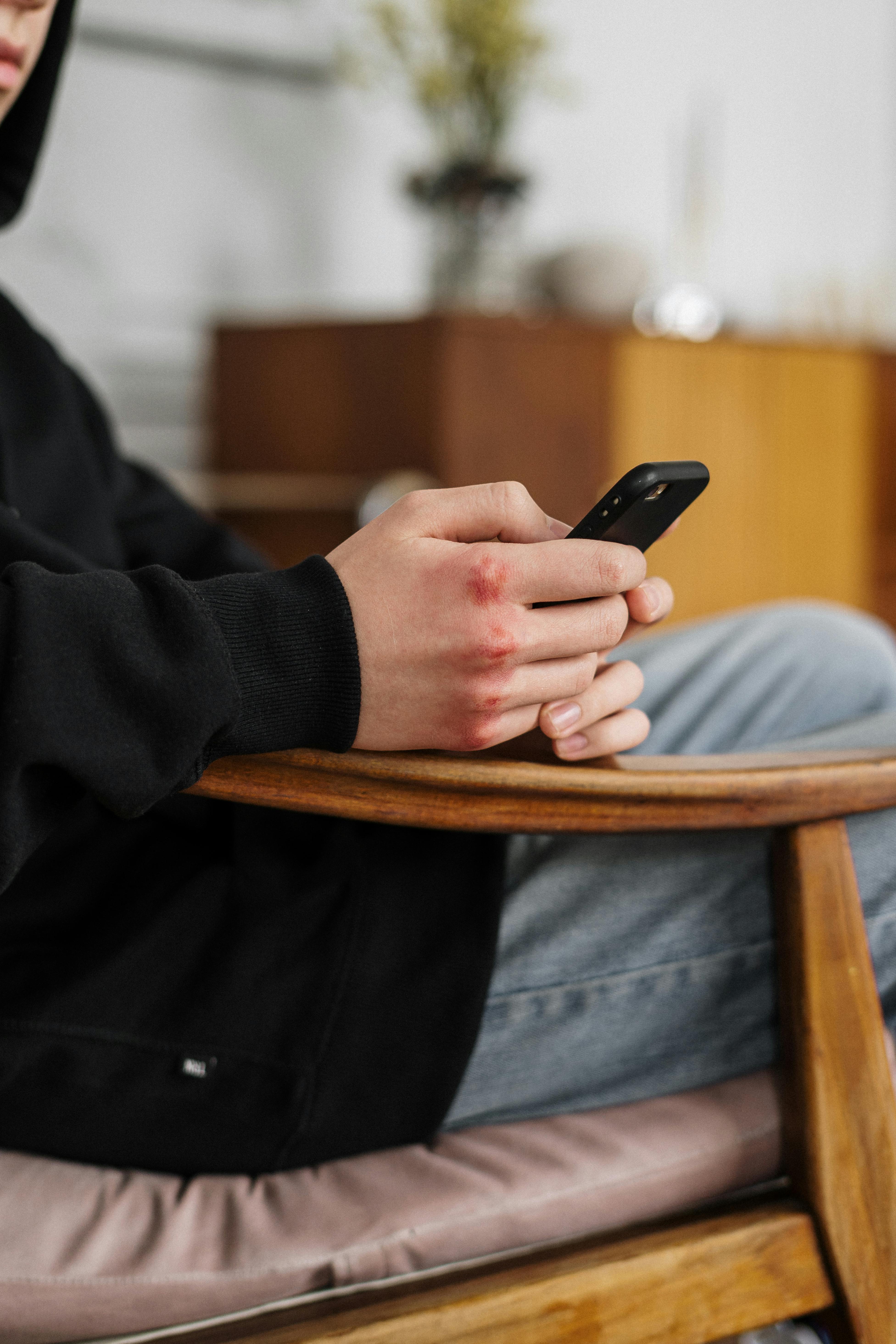 A person holding a phone | Source: Pexels