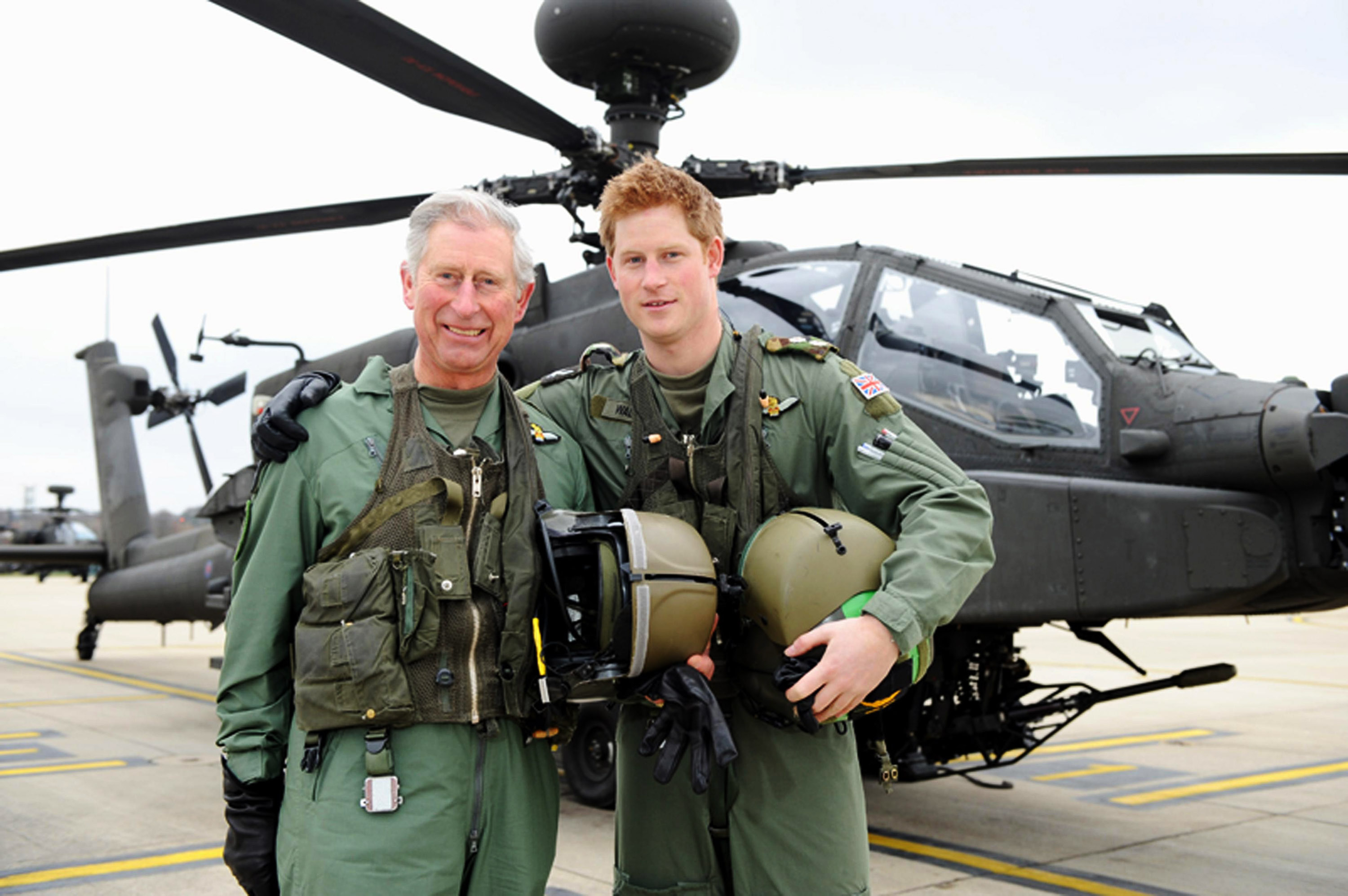 Prince Harry and his father, Prince Charles at the Army Aviation Centre on March 21, 2011 in Middle Wallop, England | Source: Getty Images