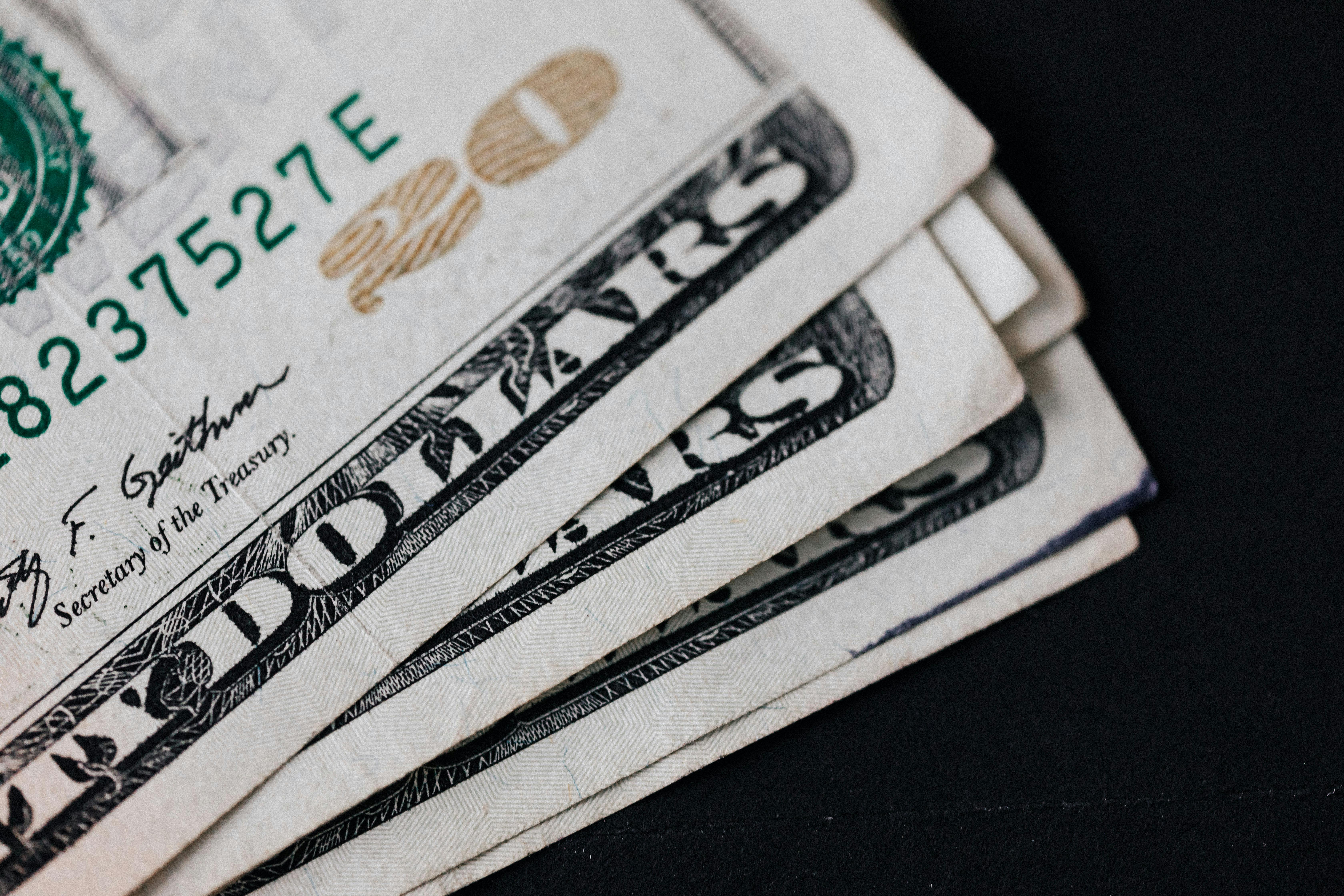 A close-up of dollar bills | Source: Pexels
