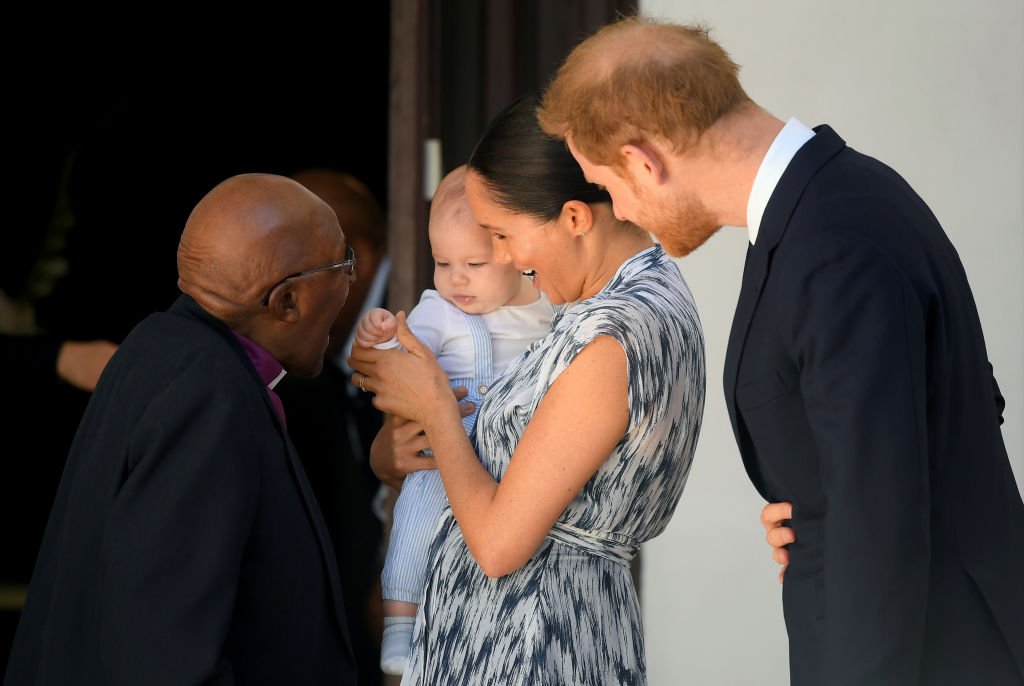  Prince Harry, Meghan, and their baby son Archie Mountbatten-Windsor meet Archbishop Desmond Tutu and his daughter Thandeka Tutu-Gxashe at the Desmond & Leah Tutu Legacy Foundation. | Source: Getty Images