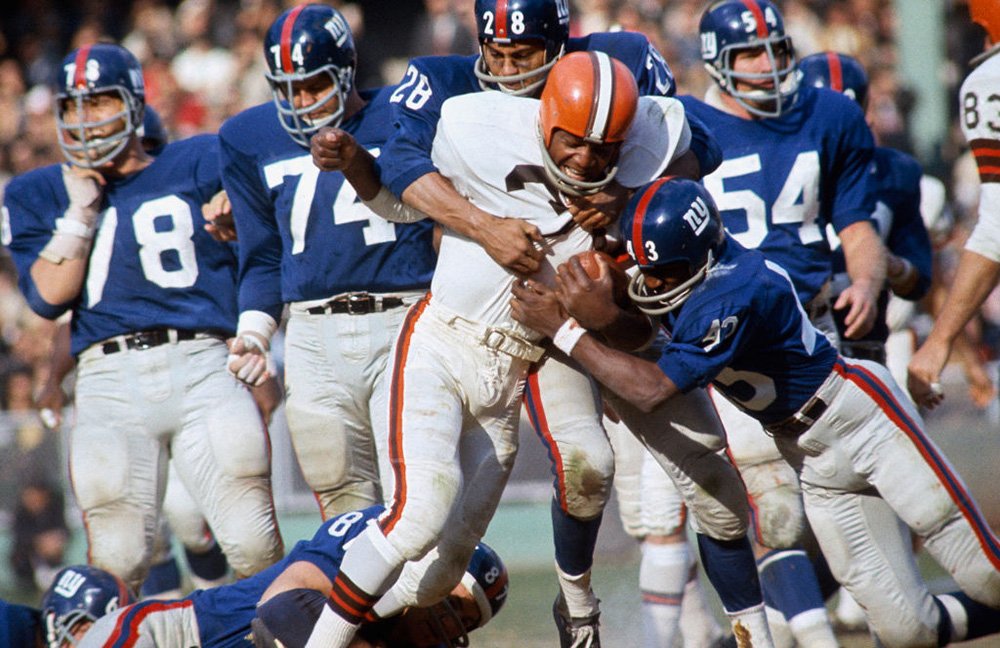 Cleveland Browns' Jim Brown (32) in action, rushing vs the New York Giants at Yankee Stadium. Bronx, NY 10/24/1965. I Image: Getty Images.