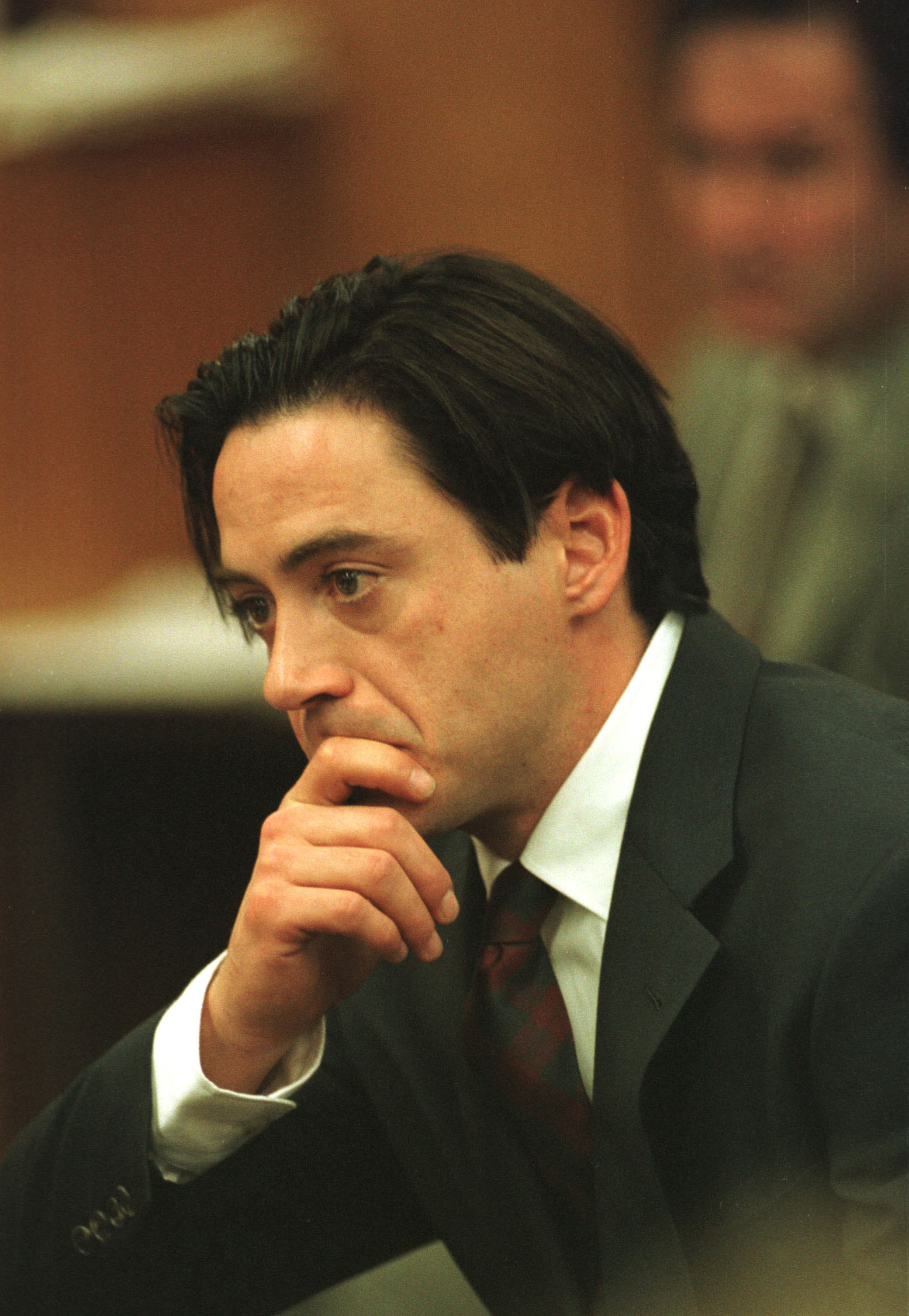 Robert Downey Jr. as he was being sentenced for jail time for charges of cocaine and speed possesion at a courtroom in Malibu, California, on December 8, 1997 | Source: Getty Images
