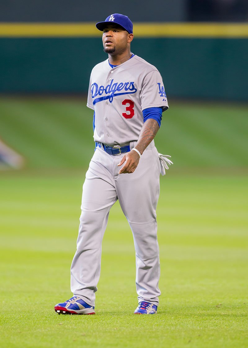 Justin Crawford poses with his father, former Major League Baseball player  Carl Crawford, after …