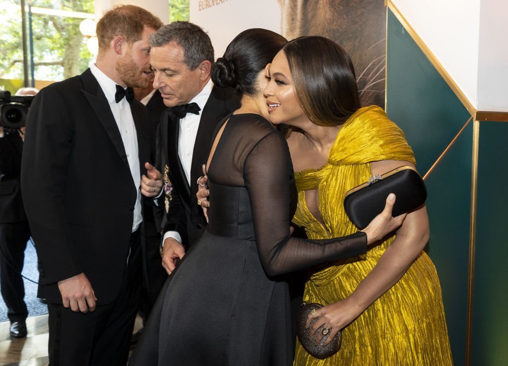 Prince Harry, Duke of Sussex and Meghan, Duchess of Sussex greet Disney CEO Robert Iger US singer-songwriter Beyoncé at the European Premiere of Disney's "The Lion King" at Odeon Luxe Leicester Square. | Photo: Getty Images