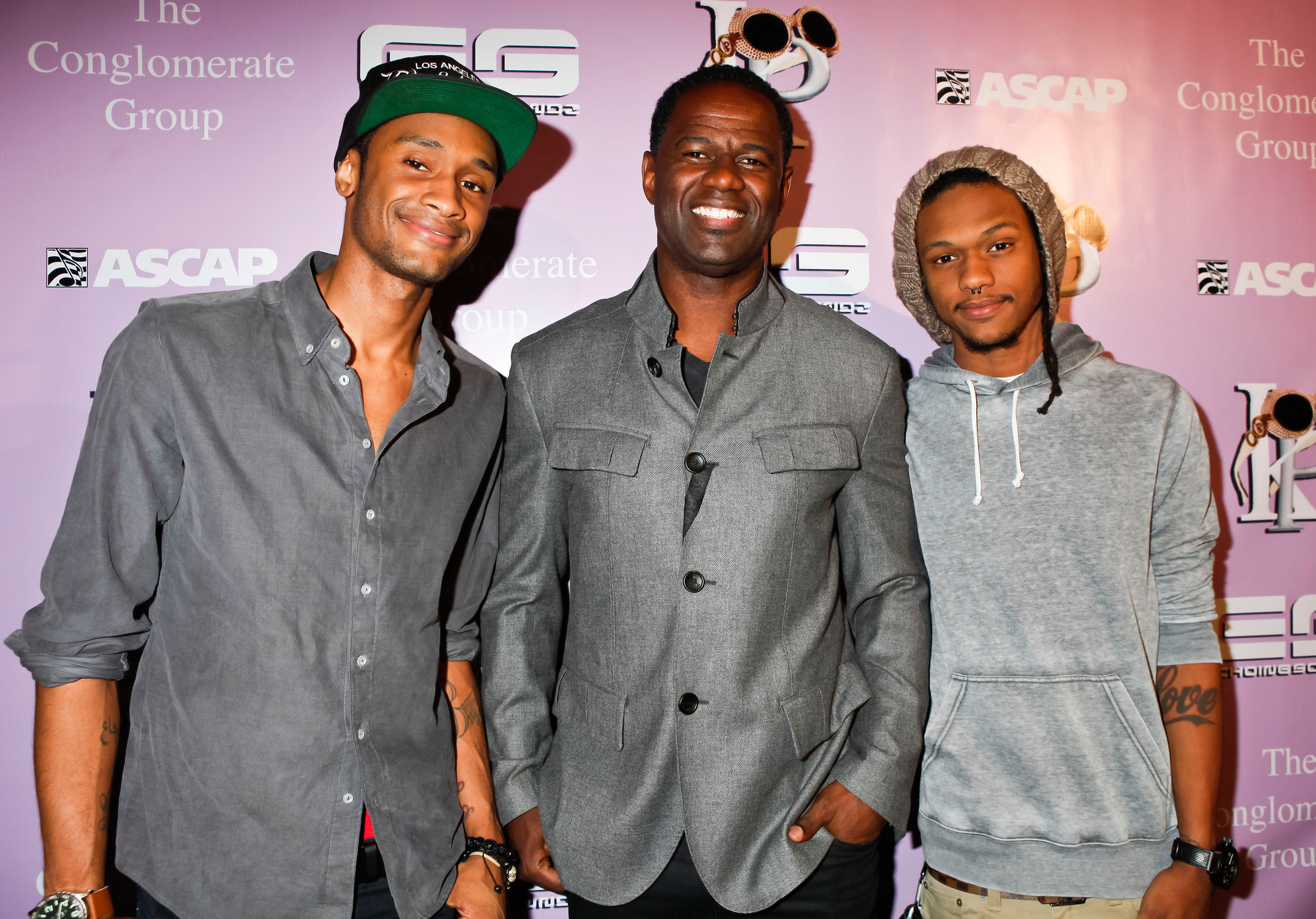 Brian Jr., Brian, and Niko McKnight arrive to The love of R&B Grammy Party on February 9, 2012  | Source: Getty Images