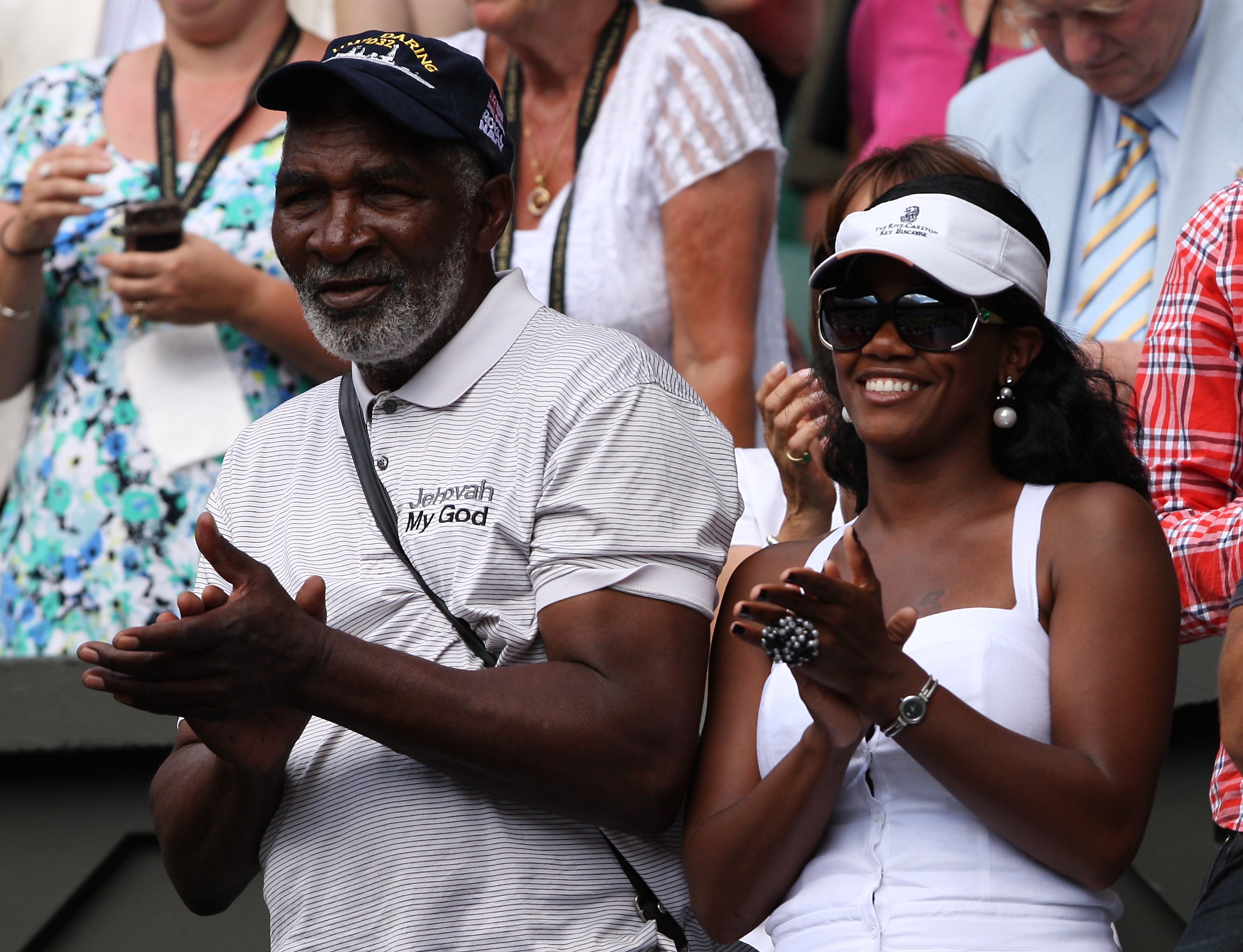  Richard Williams and Lakeisha Graham celebrate after Serena Williams' defeat against Russia's Vera Zvonareva in the Women's Final at the 2010 Wimbledon Championships | Source: Getty Images