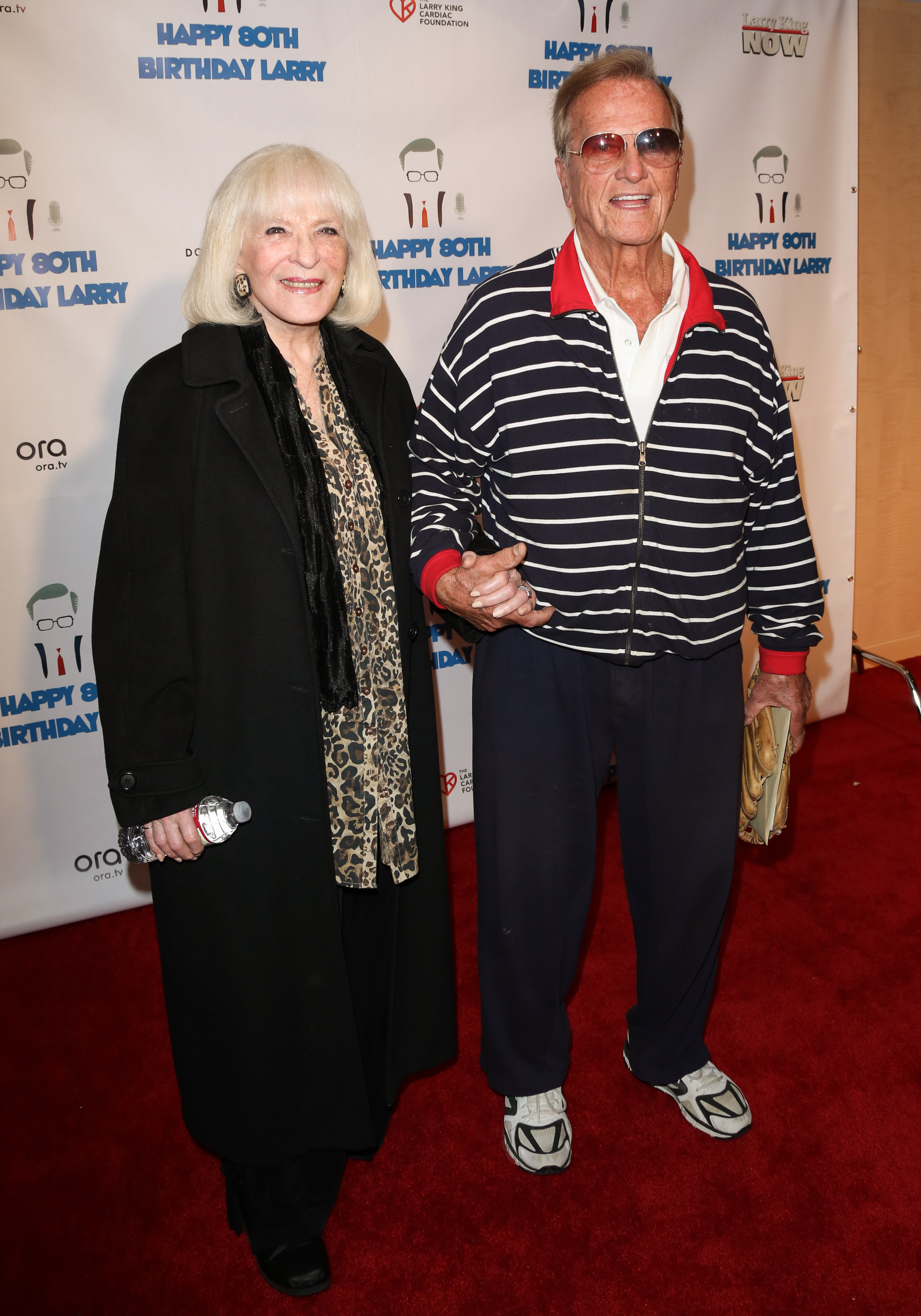 Pat and Shirley Boone at a surprise party for Larry King's 80th Birthday at Dodger Stadium in 2013 | Source: Getty Images