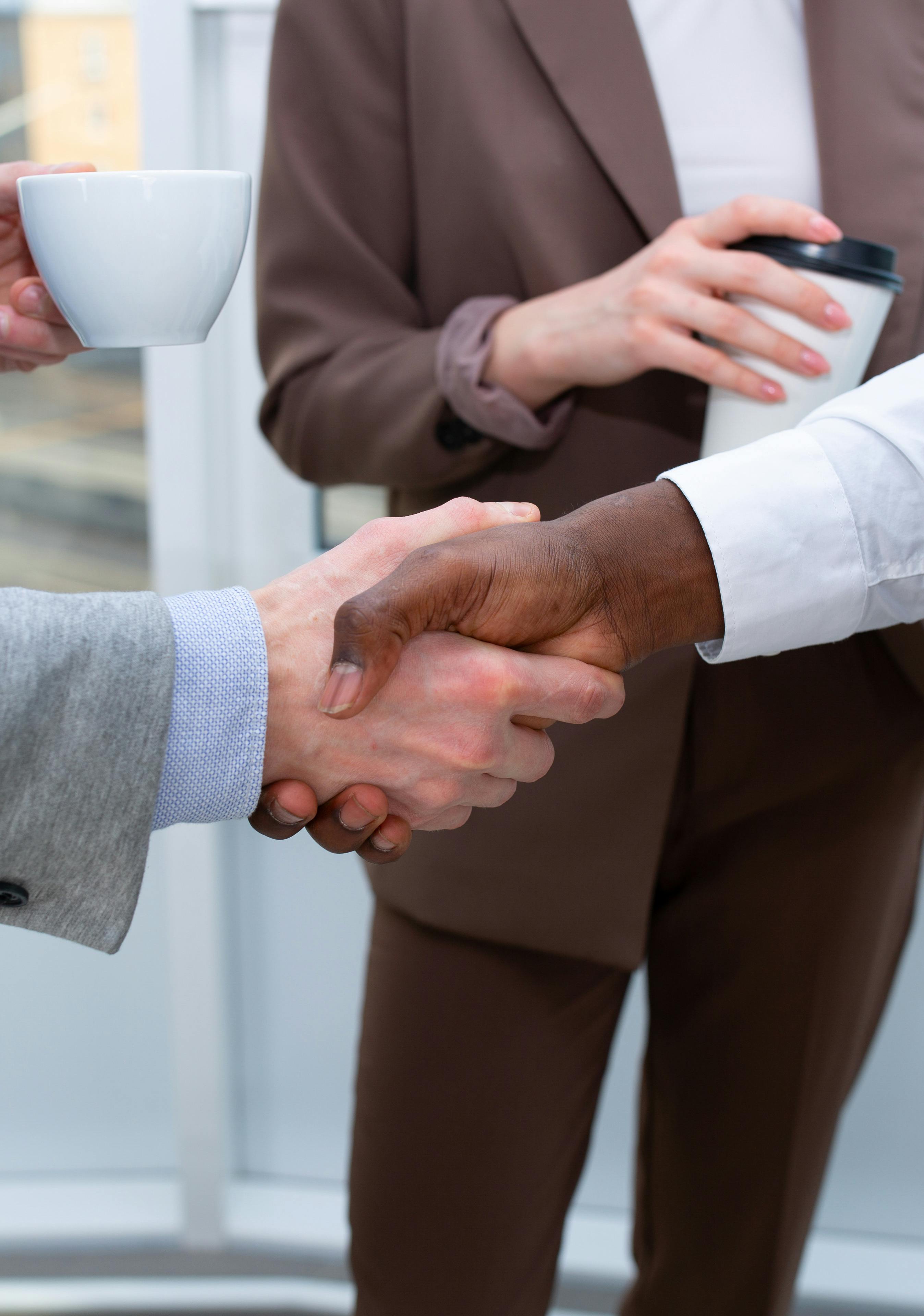 Two businessmen shaking hands | Source: Pexels