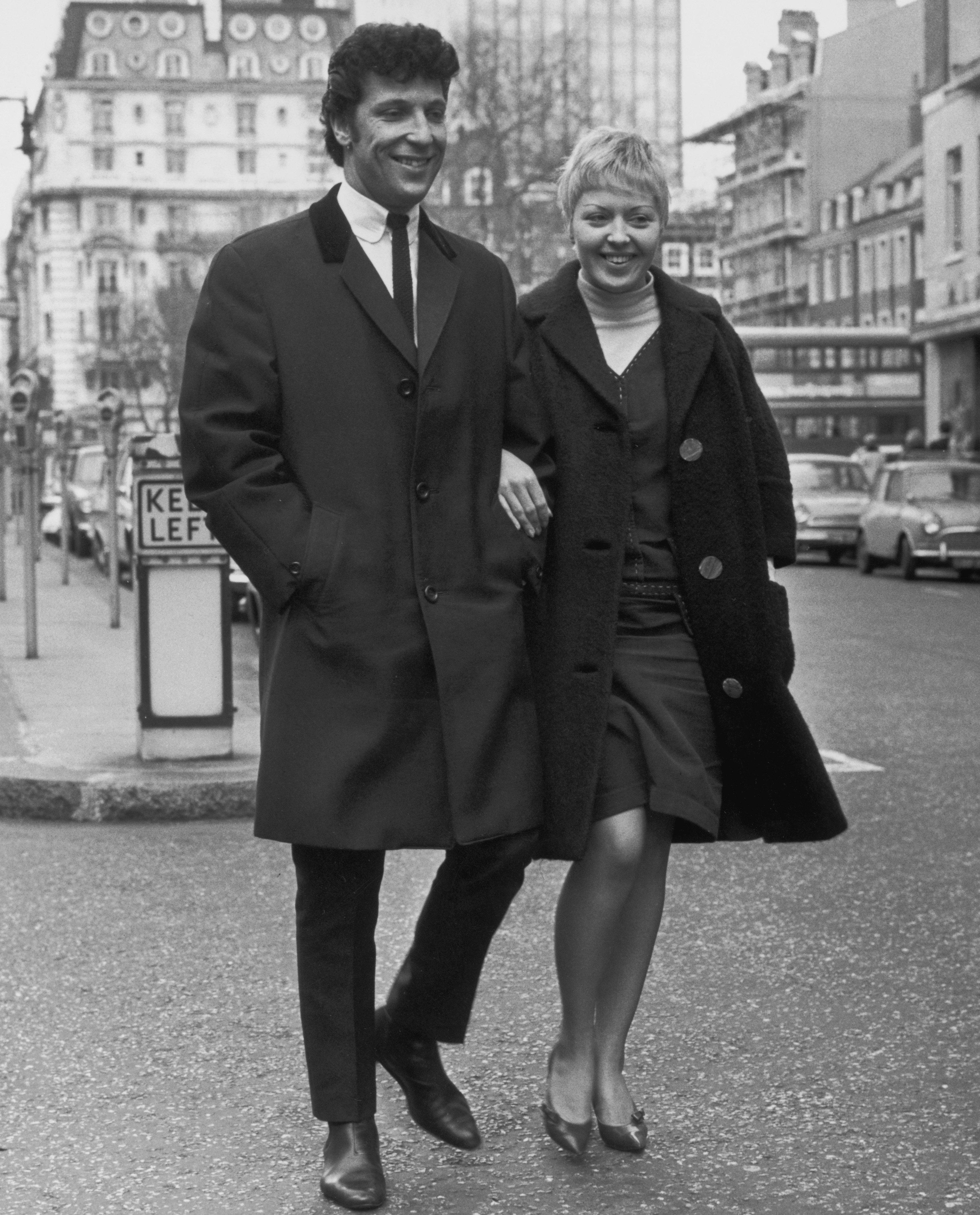 Tom Jones and Linda walking down a street circa 1965. | Source: Getty Images