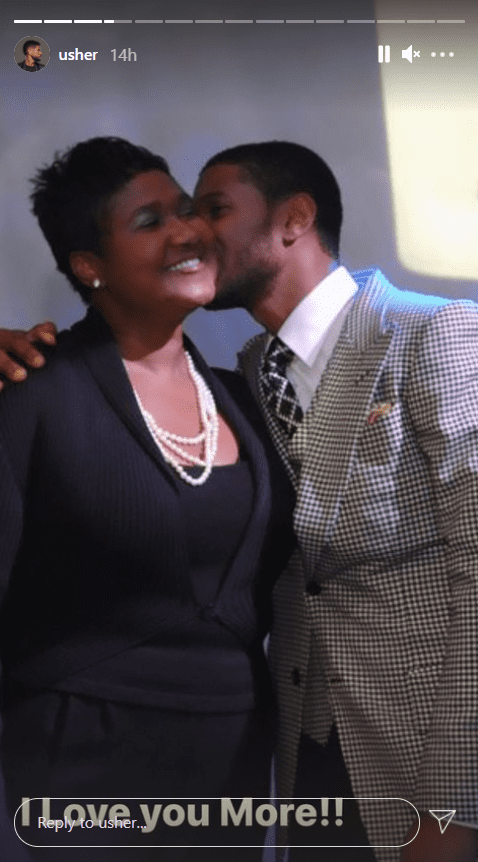 Usher Raymond and his mom posing for a photograph | Photo: Instagram/usher