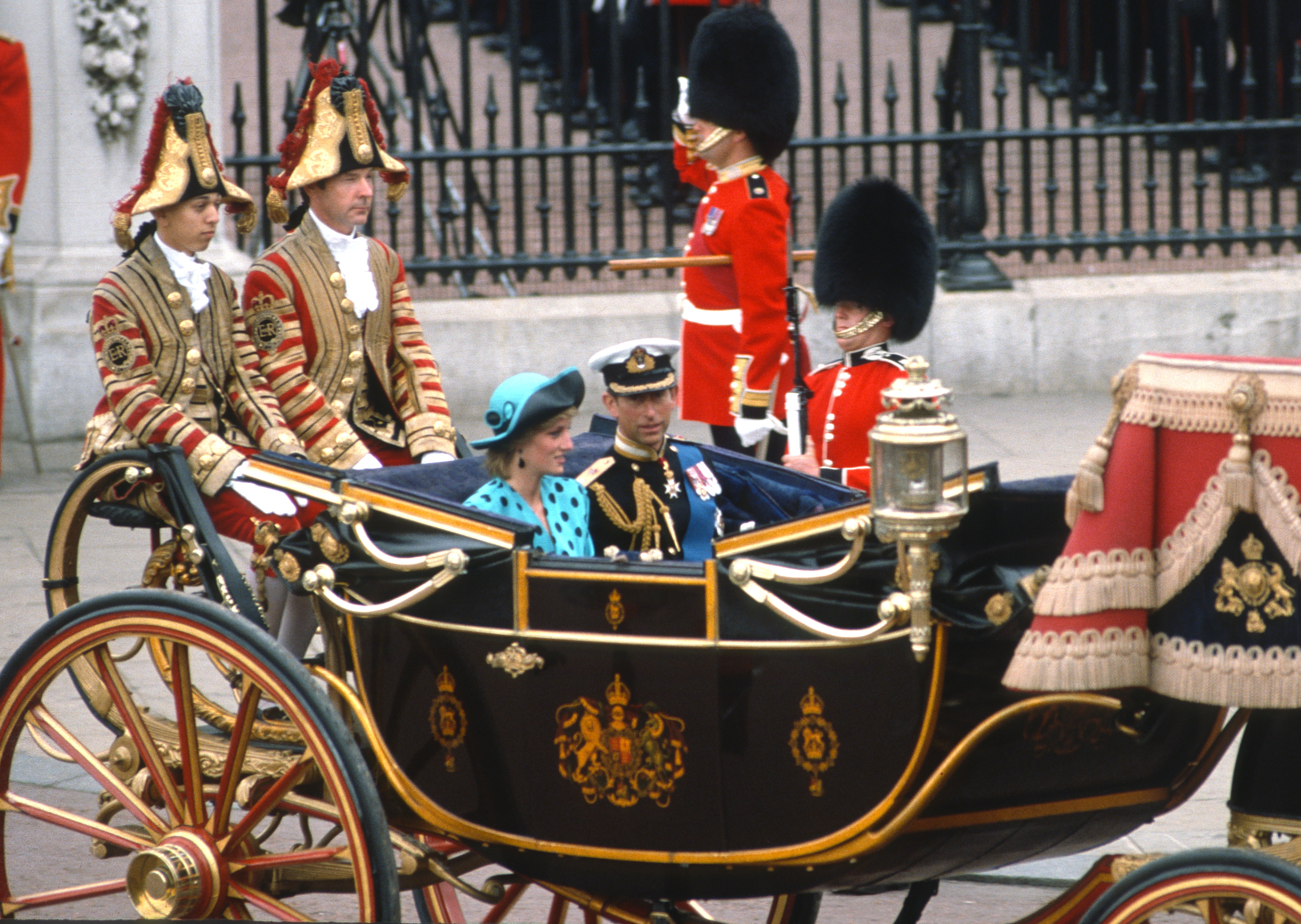 Diana, Princess of Wales and Charles, Prince of Wales pictured riding in an open carriage as they attend the wedding of Prince Andrew and Sarah Ferguson on July 23, 1986 in London, United Kingdom. / Source: Getty Images