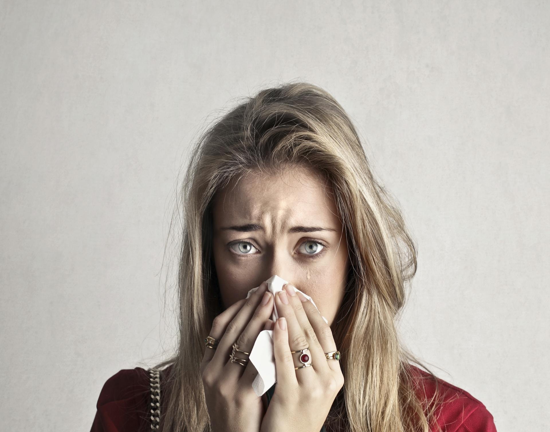 An emotional, teary-eyed woman | Source: Pexels