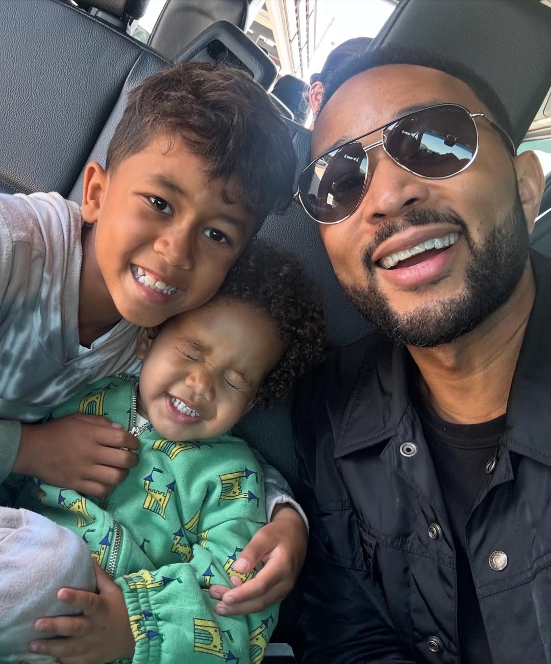 John Legend and his children from a post dated June 29, 2025. | Source: Instagram/johnlegend