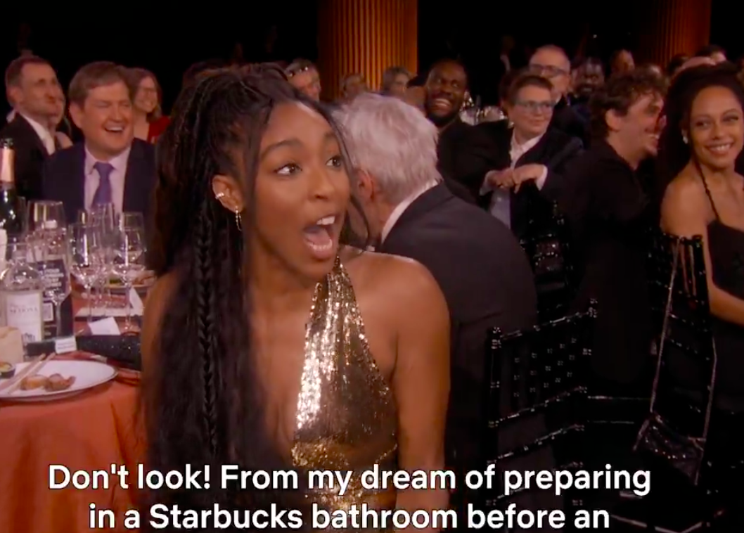 Jessica Williams shouting at Harrison Ford as he turns his chair back around. | Source: X/@netflix