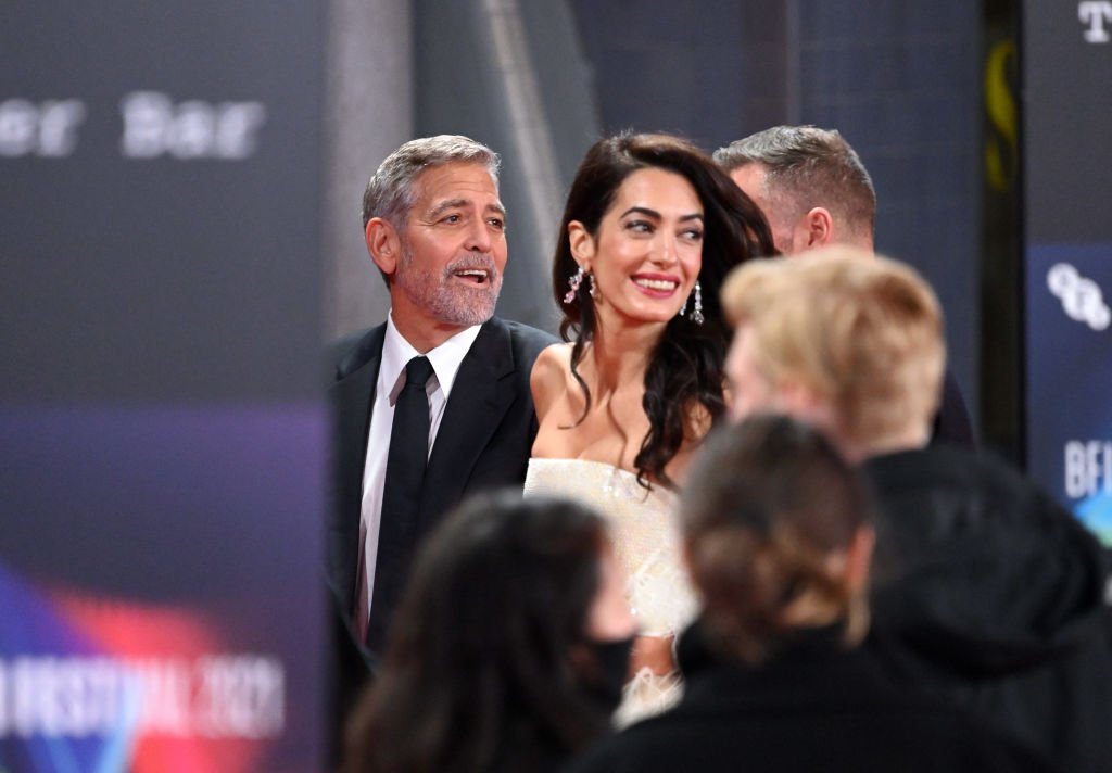 George Clooney and Amal Clooney attend "The Tender Bar" Premiere during the 65th BFI London Film Festival at The Royal Festival Hall on October 10, 2021. | Photo: Getty Images