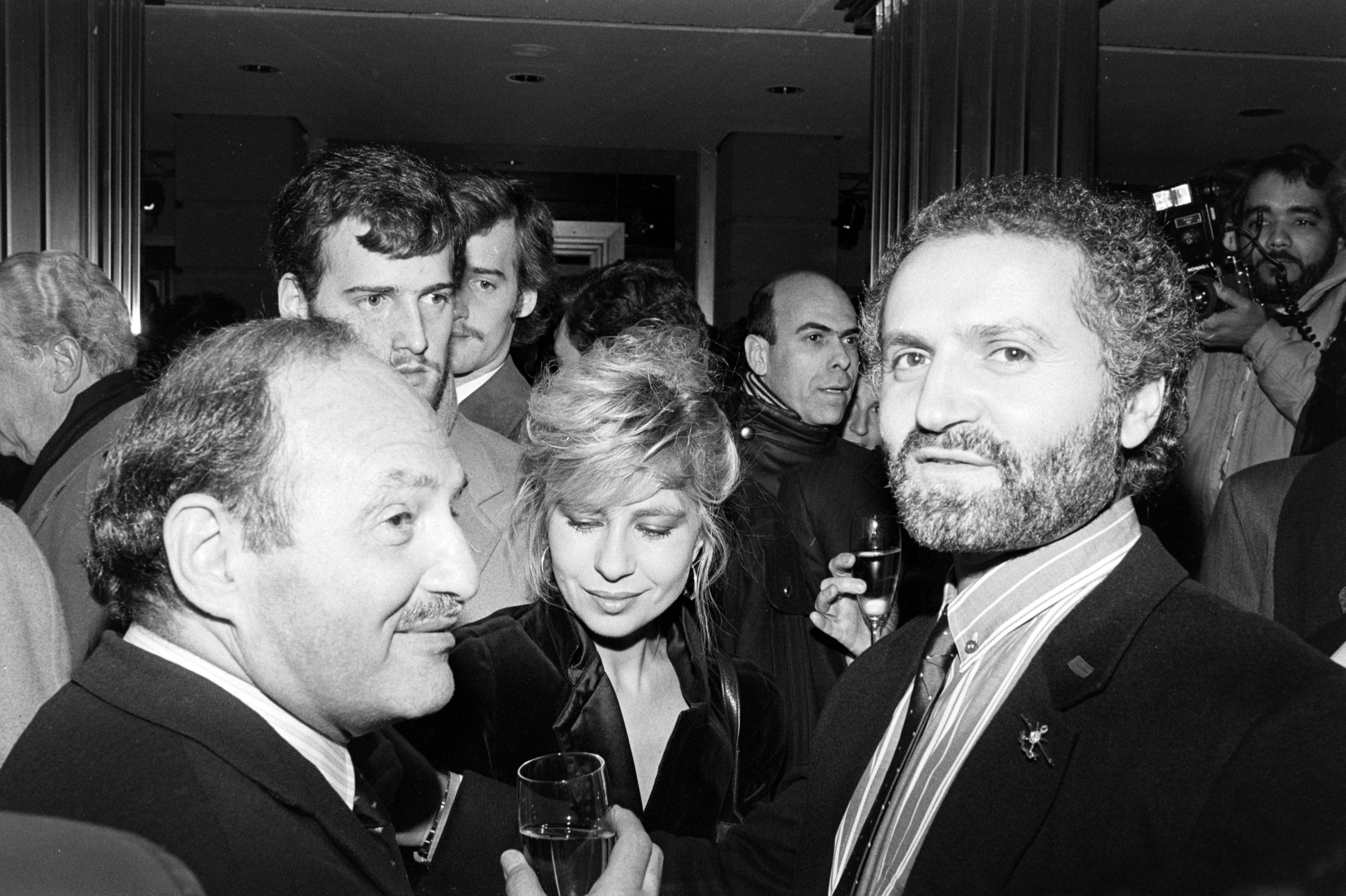 Gianni, Donatella Versace, and guest at Gianni Versace Boutique Opening and Party on March 2, 1984 | Source: Getty Images