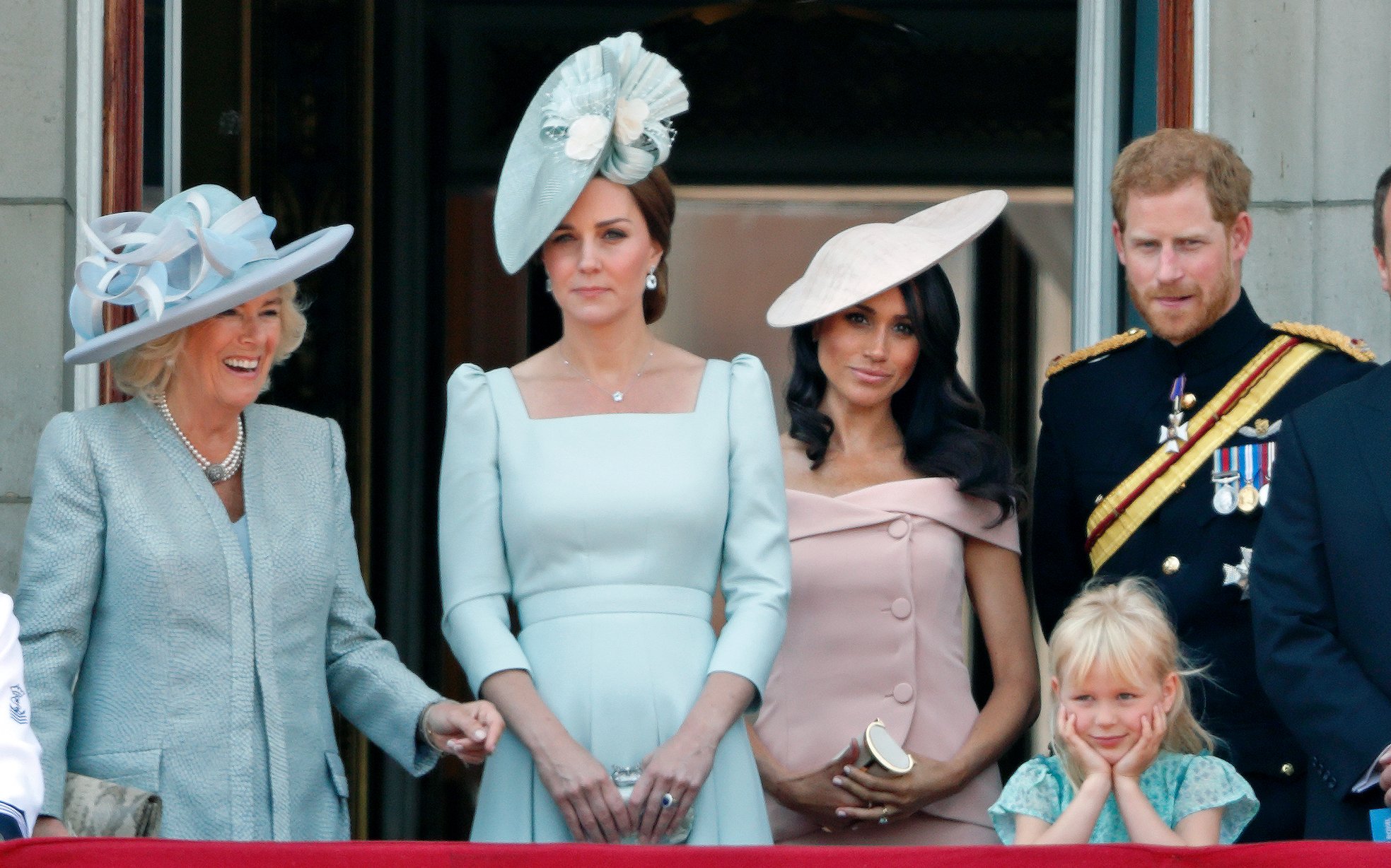 Camilla, Duchess of Cornwall, Catherine, Duchess of Cambridge, Meghan, Duchess of Sussex, Prince Harry, Duke of Sussex and Isla Phillips on the balcony of Buckingham Palace during Trooping The Colour 2018 on June 9, 2018 in London, England. / Source: Getty Images