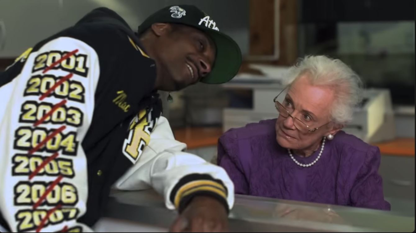 Snoop Dogg stars as Mac Johnson, a student attempting his senior year for the 15th time, in "Mac & Devin Go to High School." | Source: YouTube/SnoopDoggTV