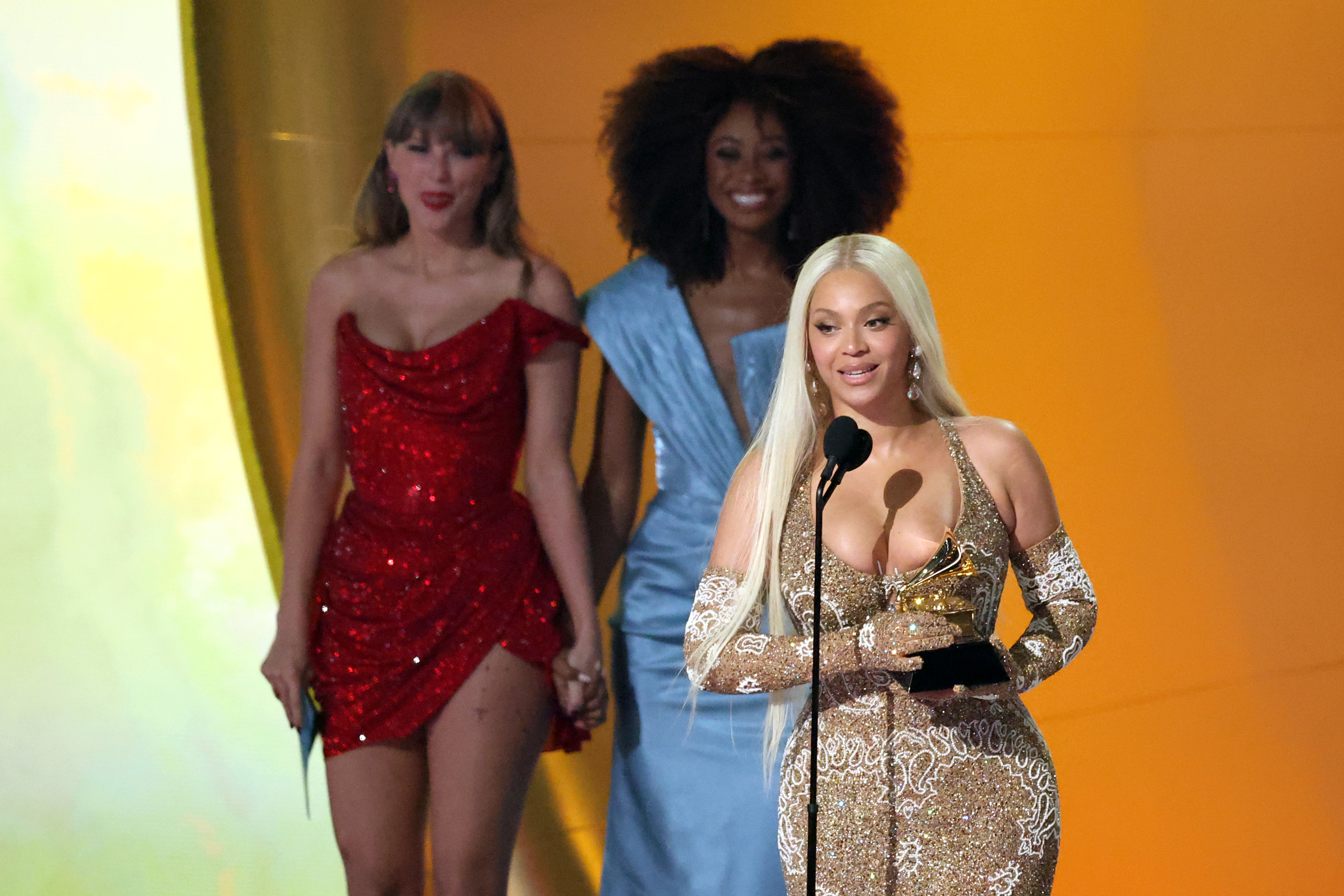 Beyoncé accepts the Best Country Album award for “Cowboy Carter” from Taylor Swift onstage during the 67th GRAMMY Awards, on February 2, 2025 | Source: Getty Images