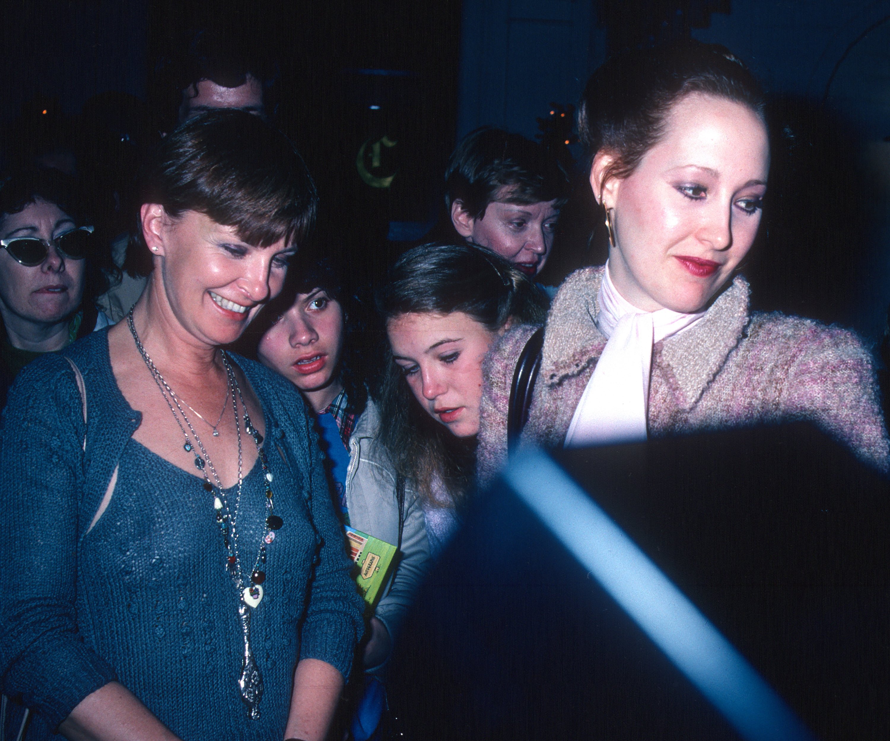 American actor Joanne Woodward (left) and her stepdaughter, film producer Susan Newman sighted at Chasen's restaurant, Beverly Hills, California, March 29, 1981. | Source: Getty Images