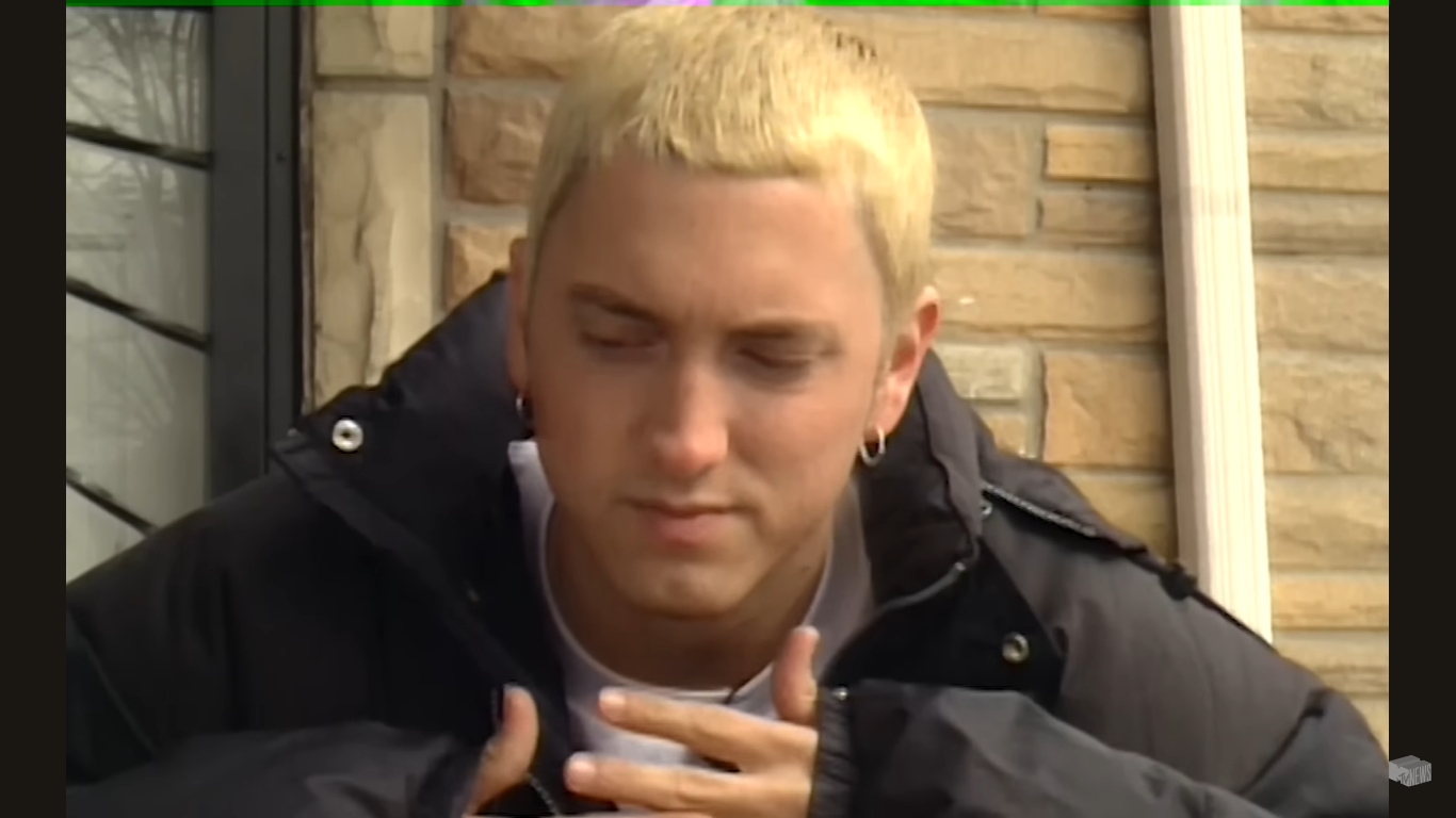 Eminem's outside his former childhood home | Source: YouTube/WatchMojo