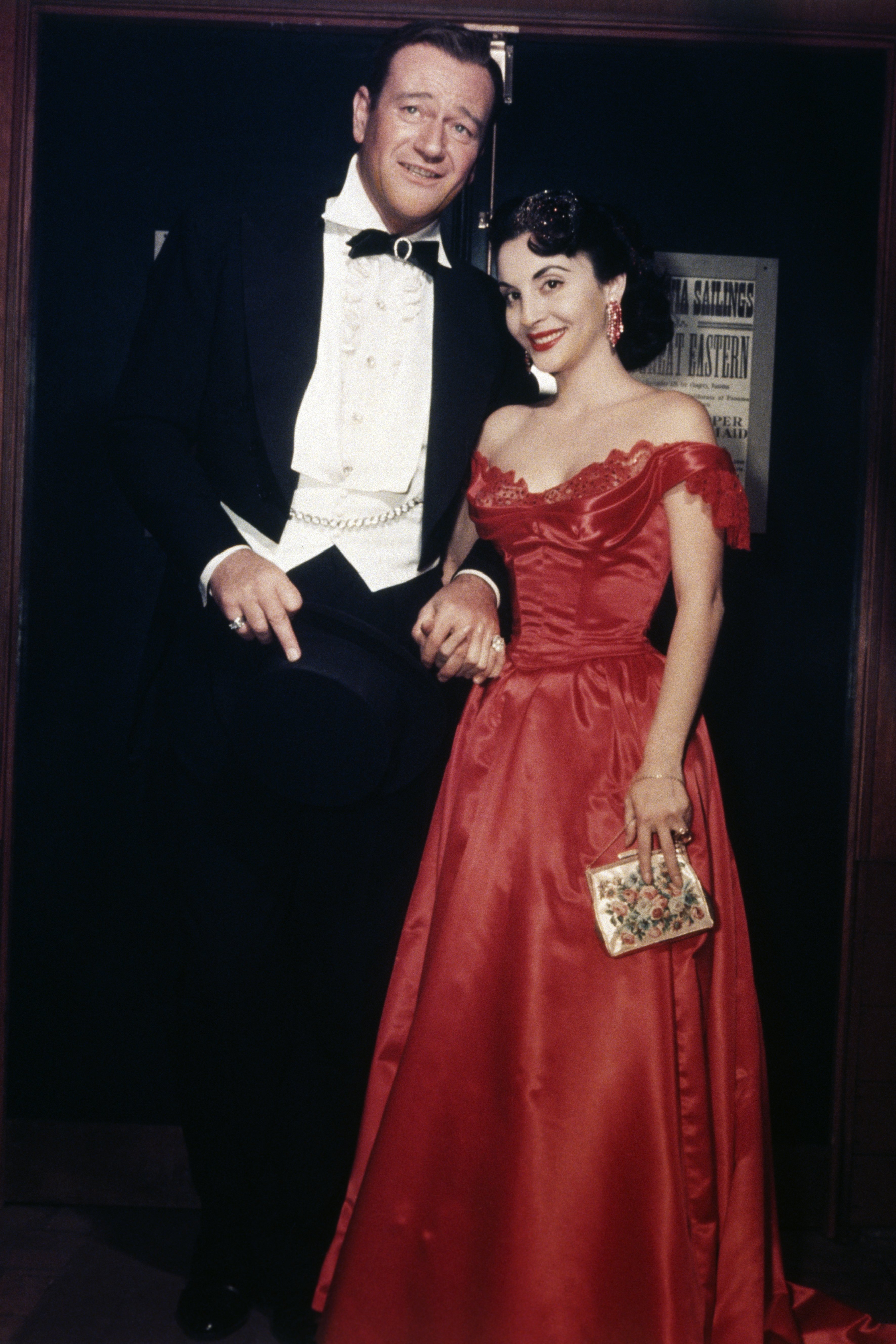 Actor John Wayne and Wife Pilar Wayne on January 1 1957 | Source: Getty Images
