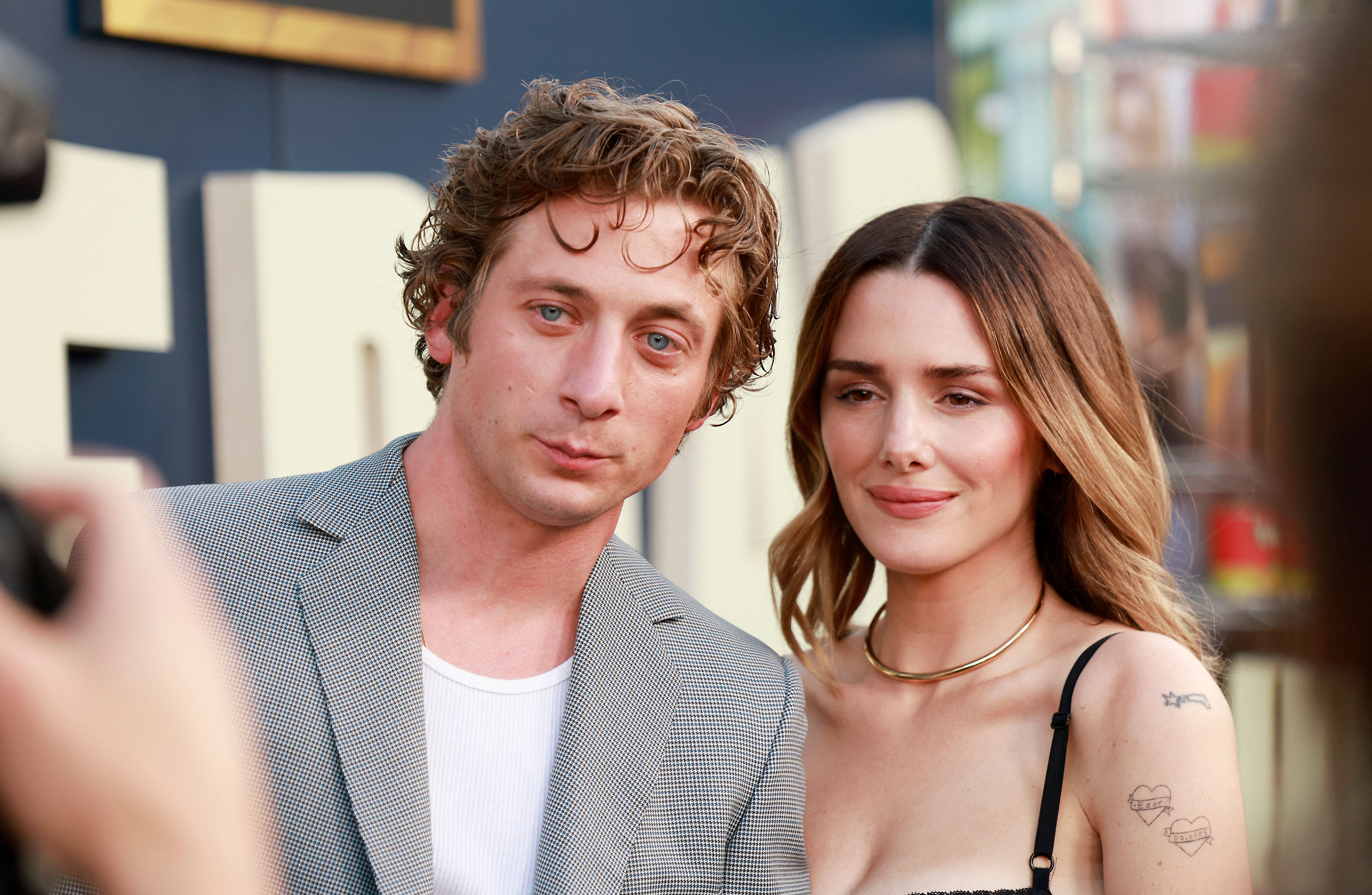 US actor Jeremy Allen White (L) and his wife actress Addison Timlin arrive to the Los Angeles premiere of FX's "The Bear" held at Goya Studios on June 20, 2022 in Los Angeles, California | Source: Getty Images