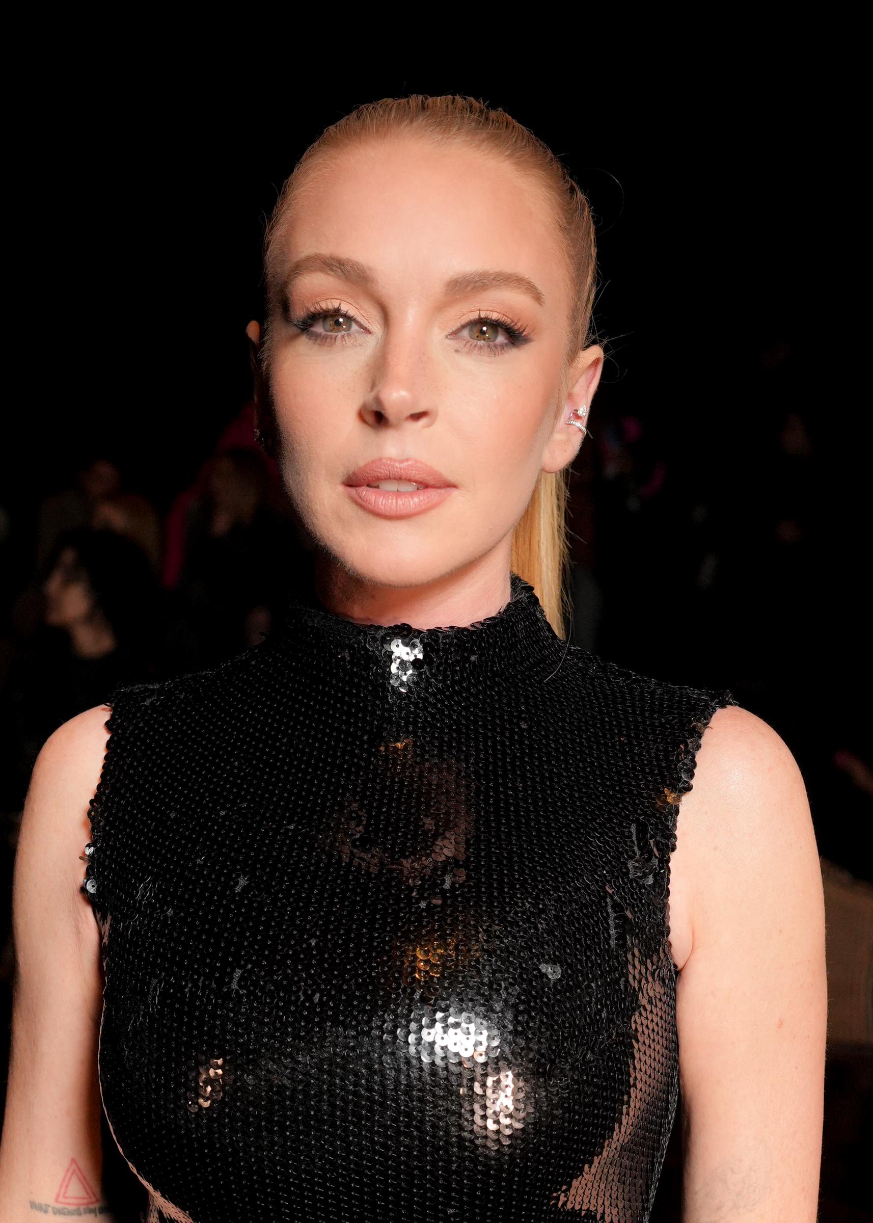 Lindsay Lohan at Paris Fashion Week in France on September 30, 2024 | Source: Getty Images