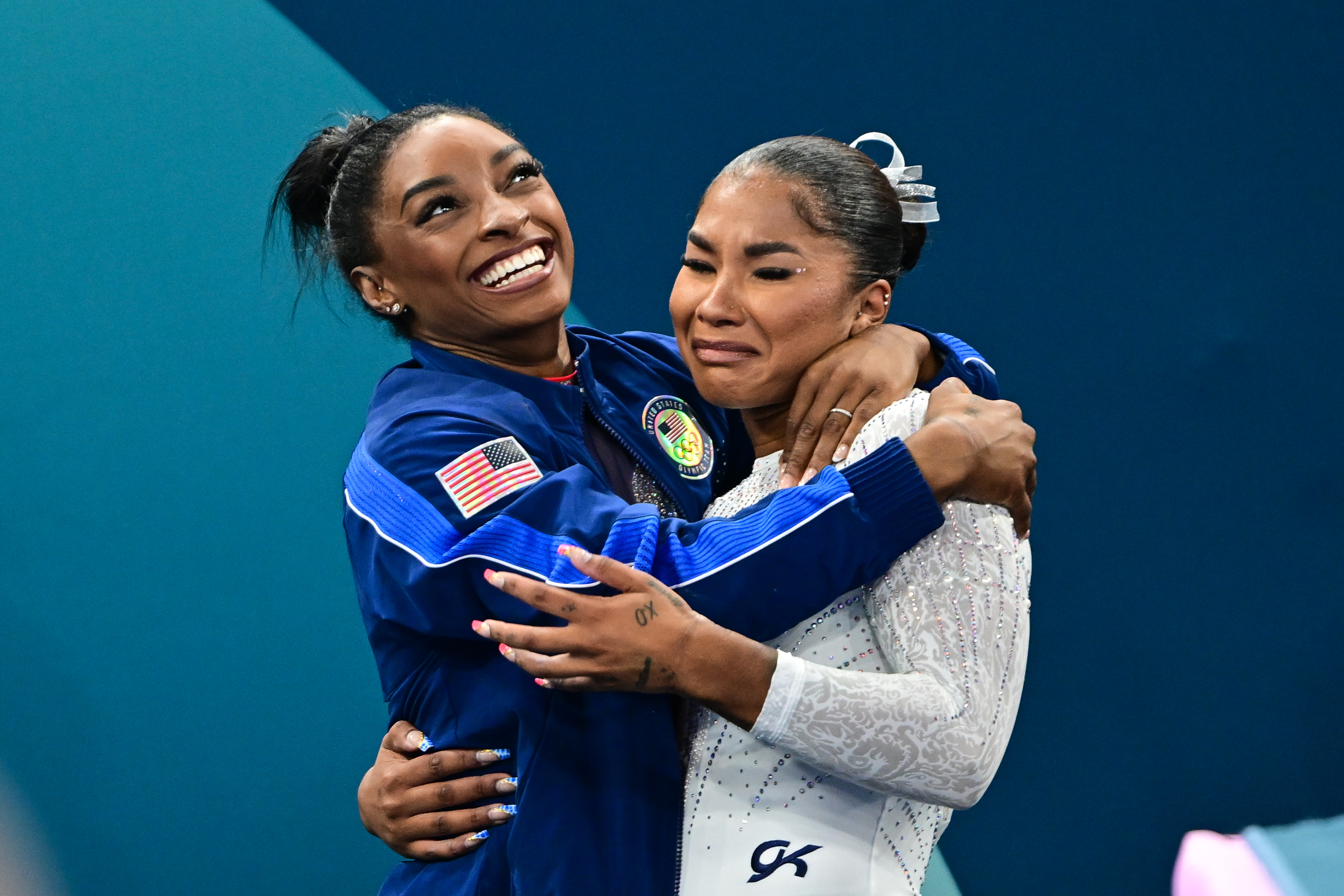 Simone Biles congratulating her teammate Jordan Chiles after she dramatically claimed the bronze medal on a score change after the Women's Floor Final during the Artistic Gymnastics competition during the Paris 2024 Summer Olympic Games on August 5, in France. | Source: Getty Images