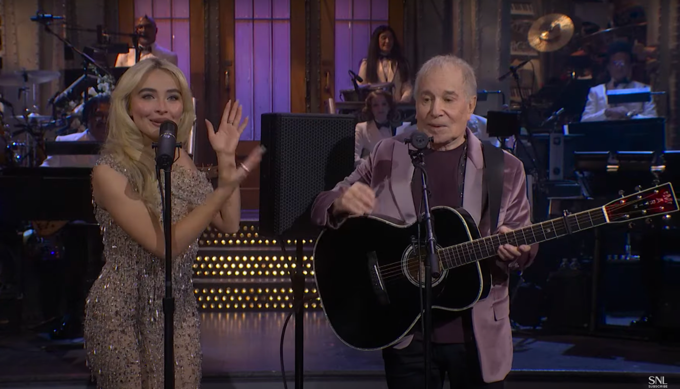 Sabrina Carpenter emphasizing how much of a legend Paul Simon is. | Source: YouTube/Saturday Night Live