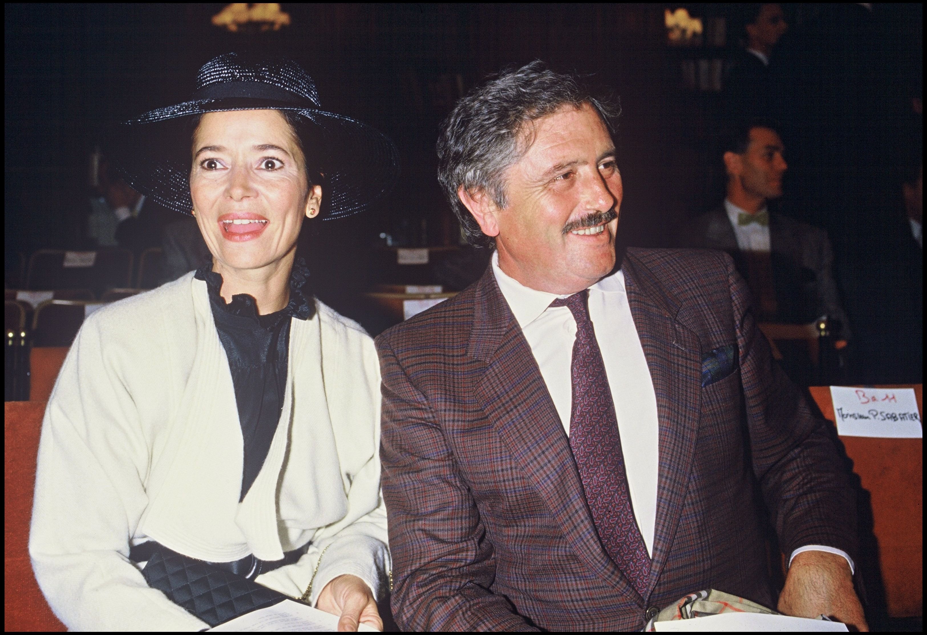 Marie-Jose Nat et Victor Lanoux au défilé Dior. | Photo : Getty Images