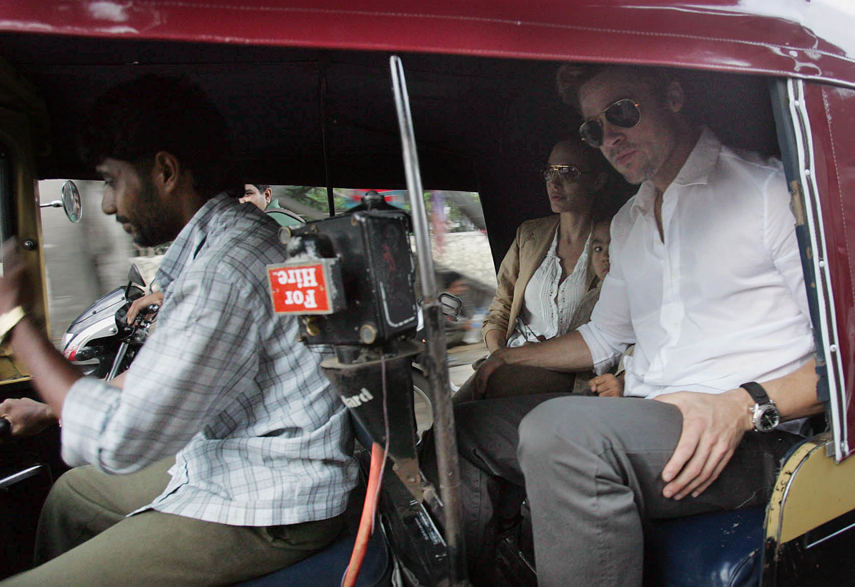 Angelina Jolie, Brad Pitt, and their son Maddox in Mumbai, India, on September 16, 2016. | Source: Getty Images