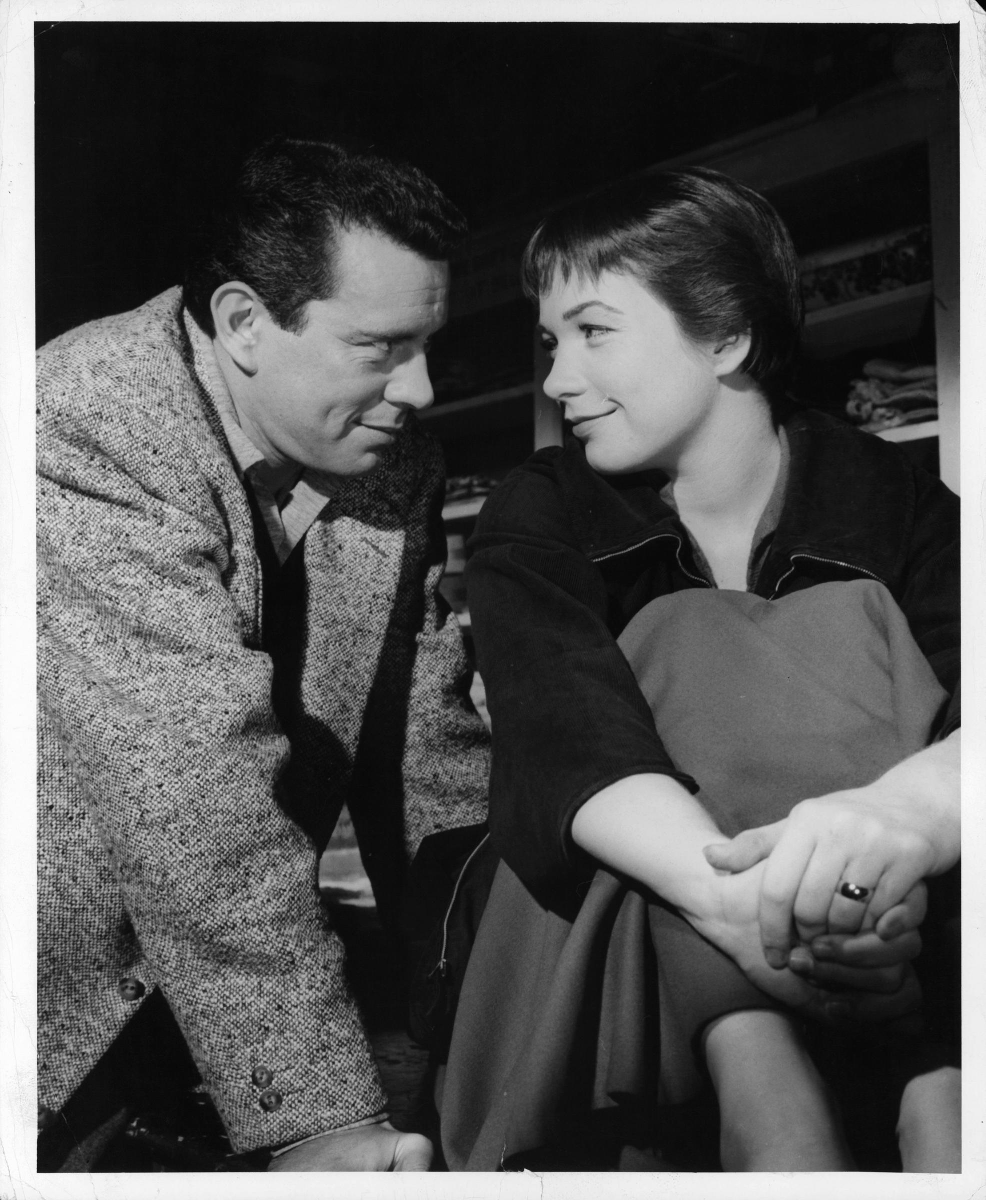 John Forsythe and the actress on the set of "The Trouble with Harry," 1955 | Source: Getty Images