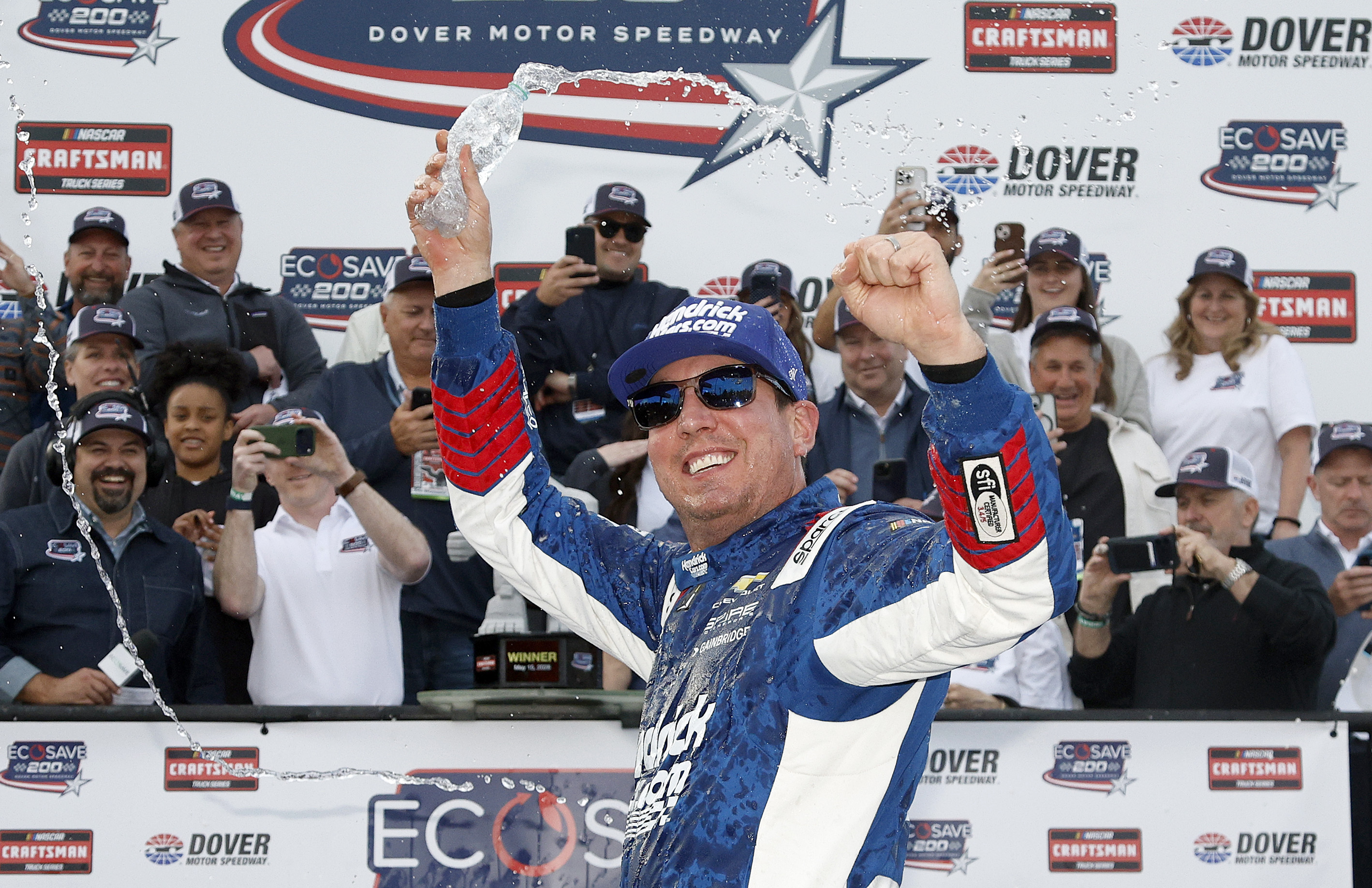 Kyle Busch celebrates after winning the NASCAR Craftsman Truck Series ECOSAVE 200 at Dover Motor Speedway in Dover, Delaware, on May 15, 2026 | Source: Getty Images