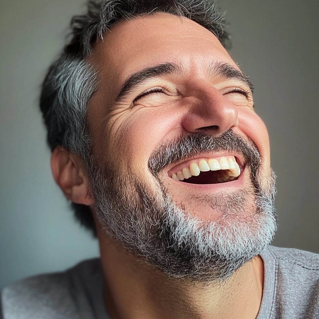 A man laughing | Source: Midjourney