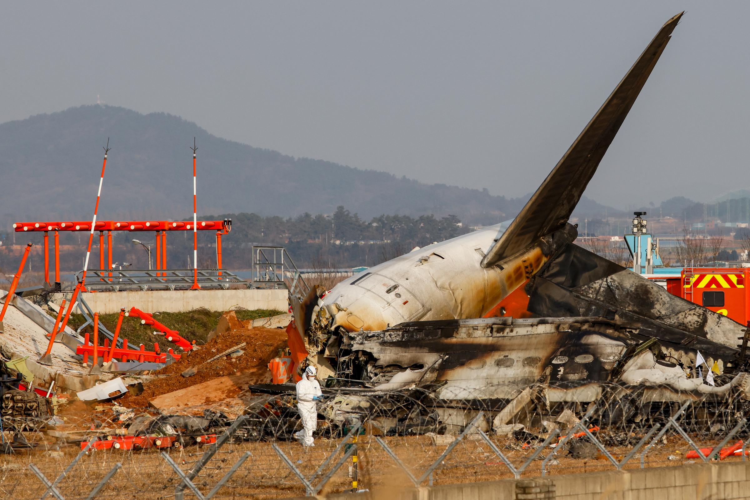 Jeju Air Flight 7C2216, a Boeing 737-800 carrying 181 people, skids off the runway and collides with a wall, triggering a devastating explosion, on December 29, 2024 | Source: Getty Images