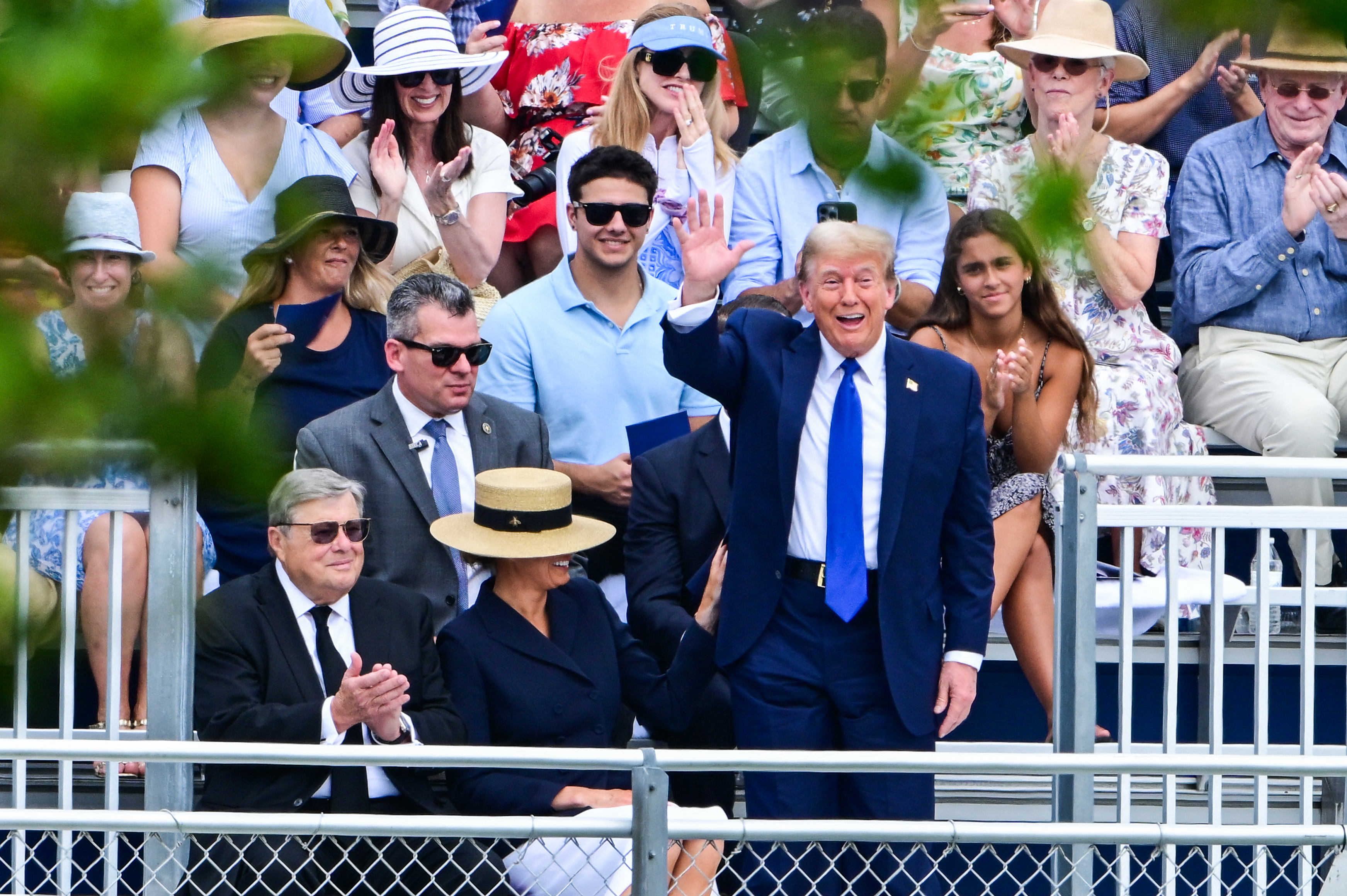 Viktor Knavs remained seated beside Melania Trump as Donald Trump acknowledged the crowd following Barron Trump's graduation. The appearance came just months after the death of his wife, Amalija Knavs, and showed that he continued to join the family for significant milestones even as he kept a low public profile. | Source: Getty Images