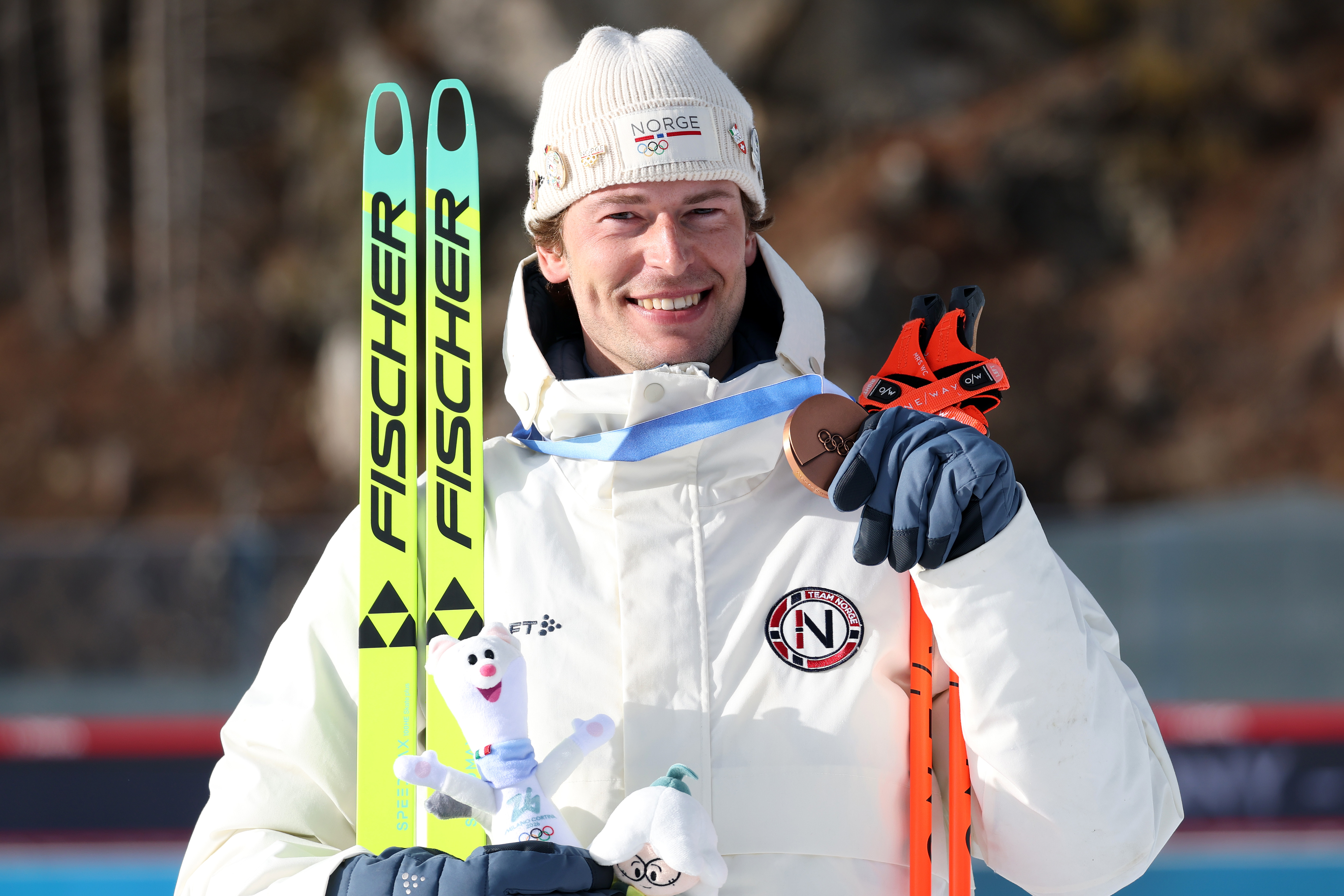 Sturla Holm Laegreid of Team Norway poses for a photo on the podium during the medal ceremony for the men’s 20km individual at the Milano Cortina 2026 Winter Olympic Games on February 10, in Antholz-Anterselva, Italy. | Source: Getty Images