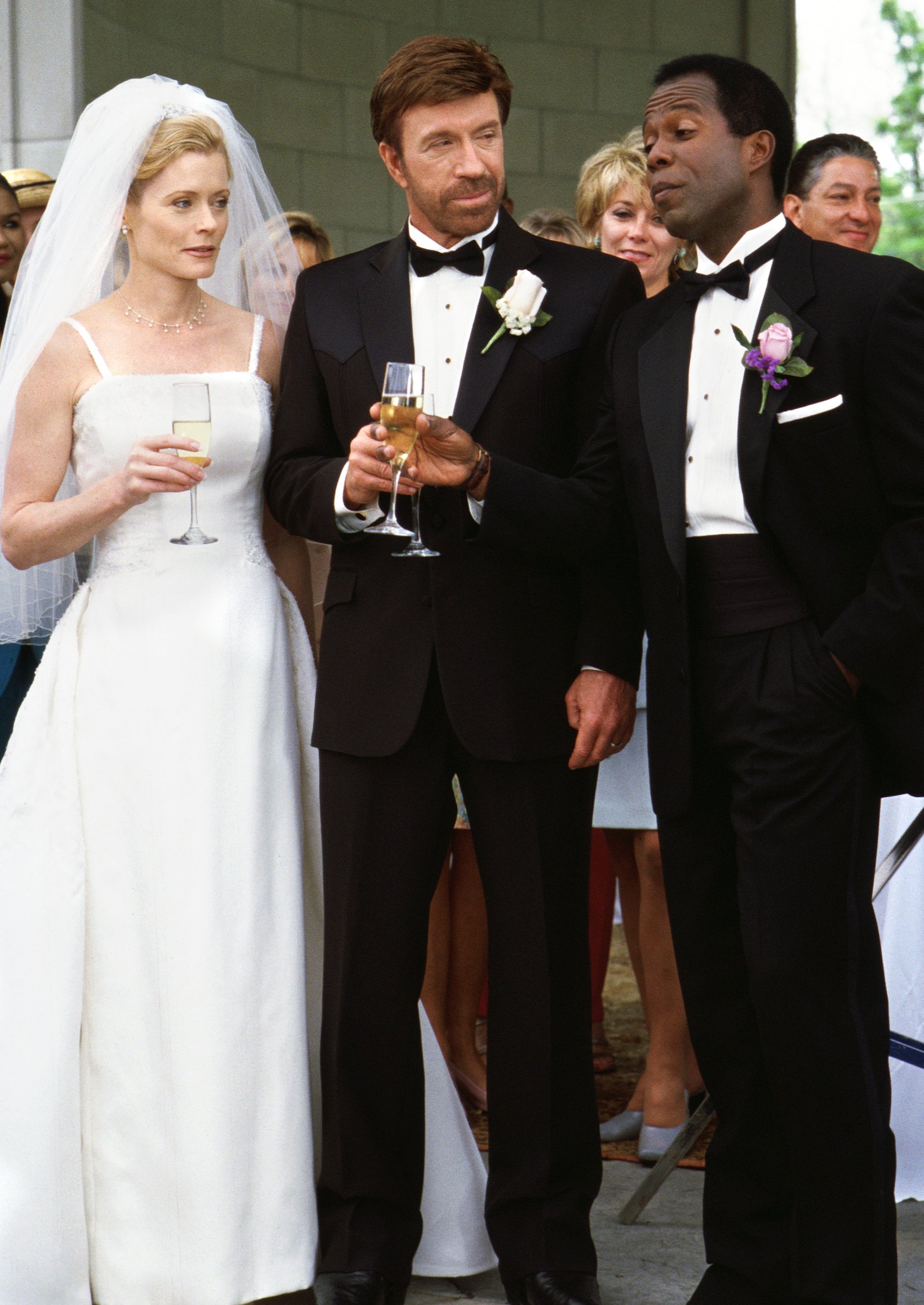 Sherre J. Wilson as Asst. D.A. Alex Cahill, Chuck Norris as Cordell "Cord" Walker, Clarence Gilyard as James "Jimmy" Trivette in "Wedding Bells". Image dated April 13, 2000 | Source: Getty Images 