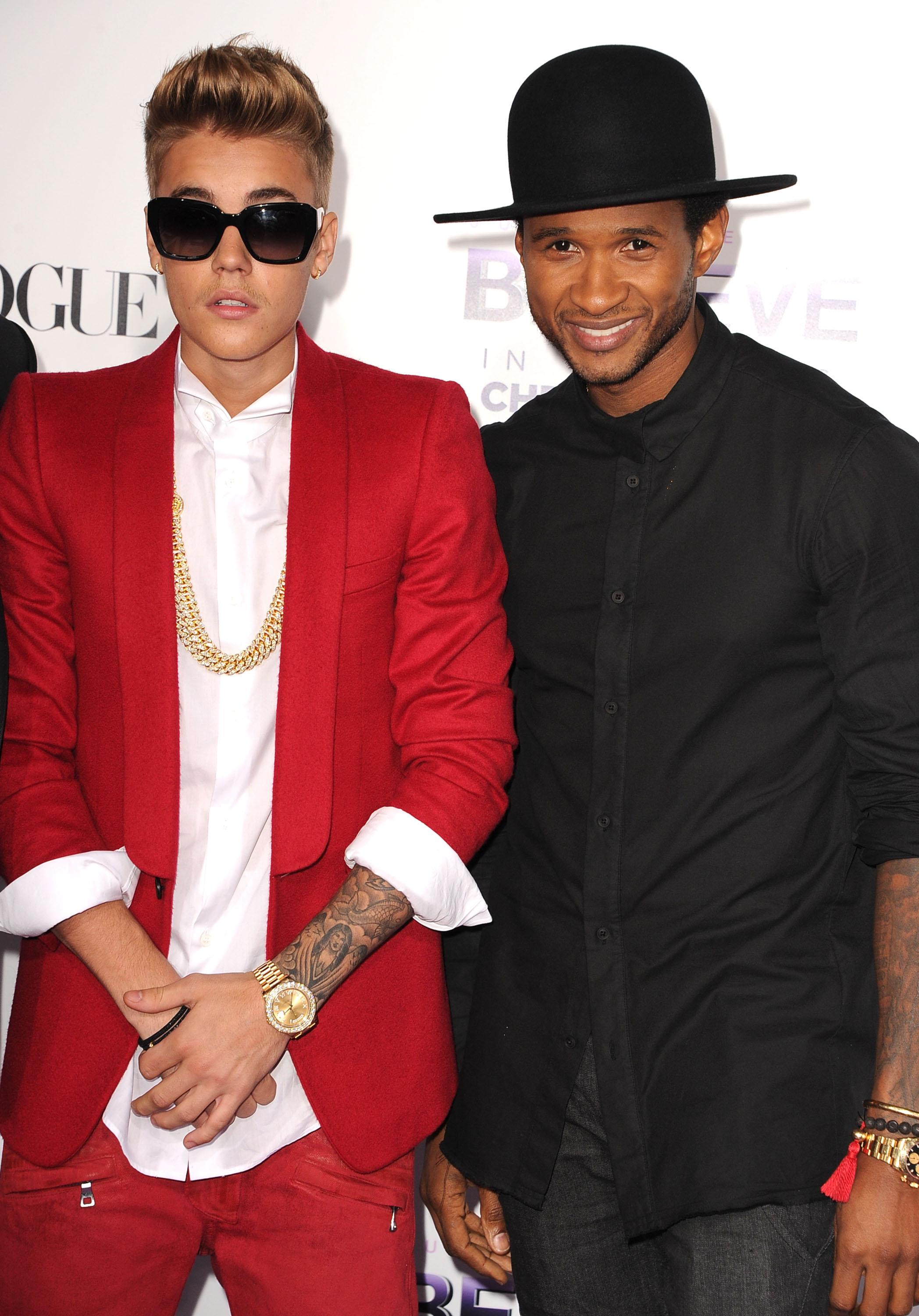 Justin Bieber and Usher arrives at the "Justin Bieber's Believe" World Premiere at Regal Cinemas L.A. Live in California on December 18, 2013. | Source: Getty Images