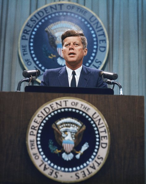 President John F. Kennedy addressed a press conference, circa 1963. | Photo: Getty Images