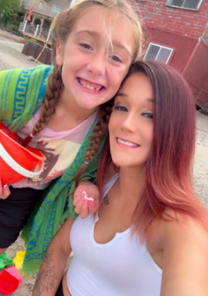 Jessica Hillard with one of her children, posted in April 2026. | Source: GoFundMe/Support Jess' Family & Memorial