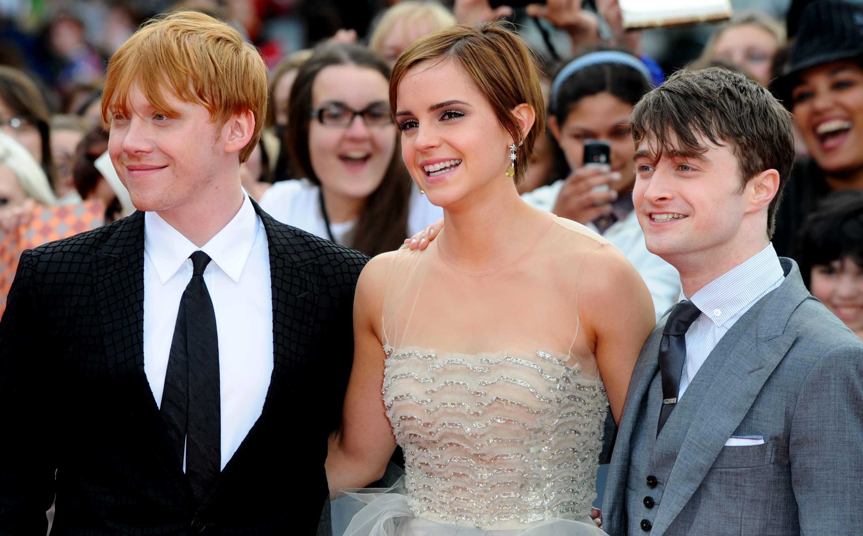 Rupert Grint, Emma Watson, and Daniel Radcliffe in London, England on July 07, 2011 | Source: Getty Images