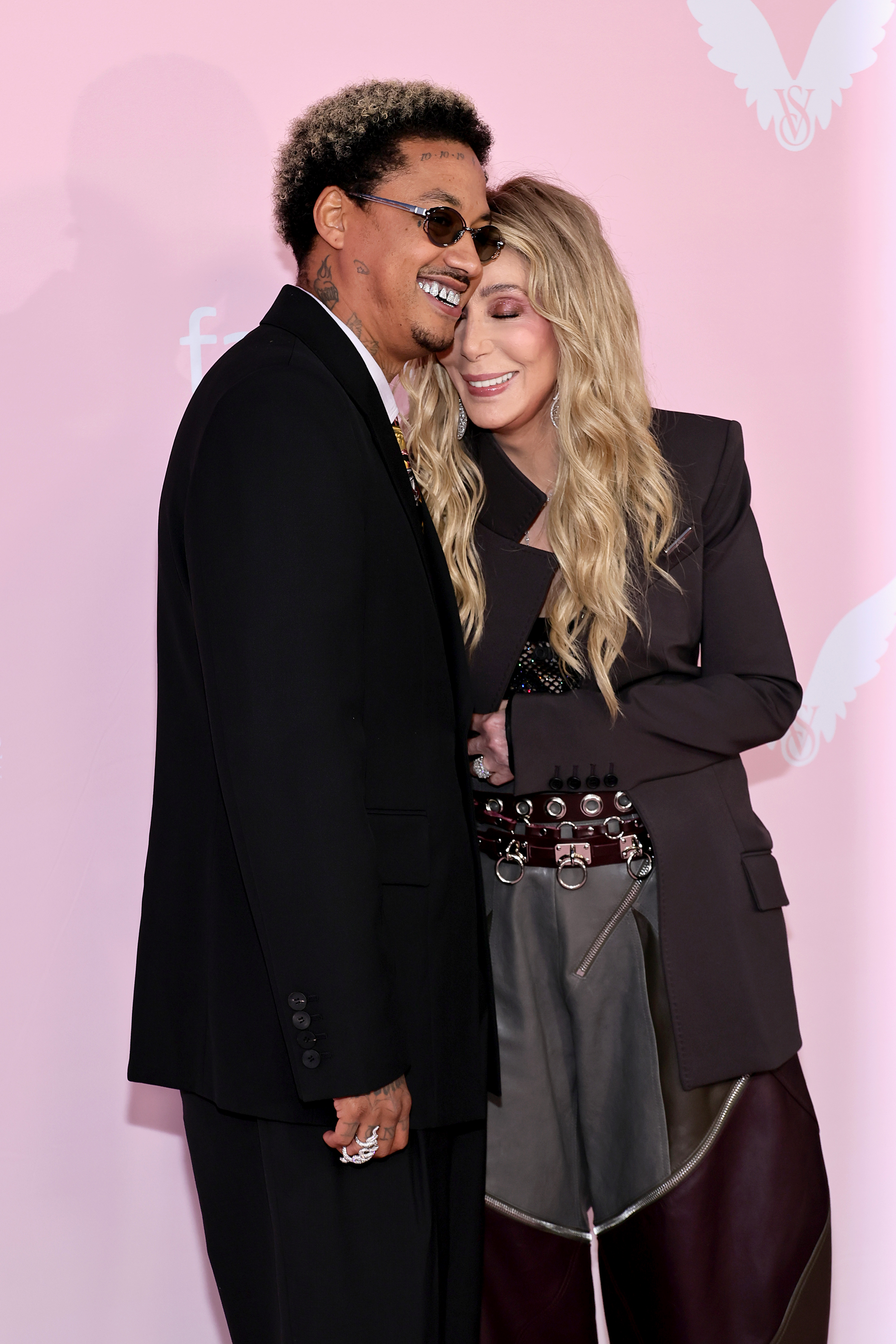 Alexander "AE" Edwards and Cher at the 2024 Victoria's Secret Fashion Show in Brooklyn, New York, on October 15, 2024 | Source: Getty Images