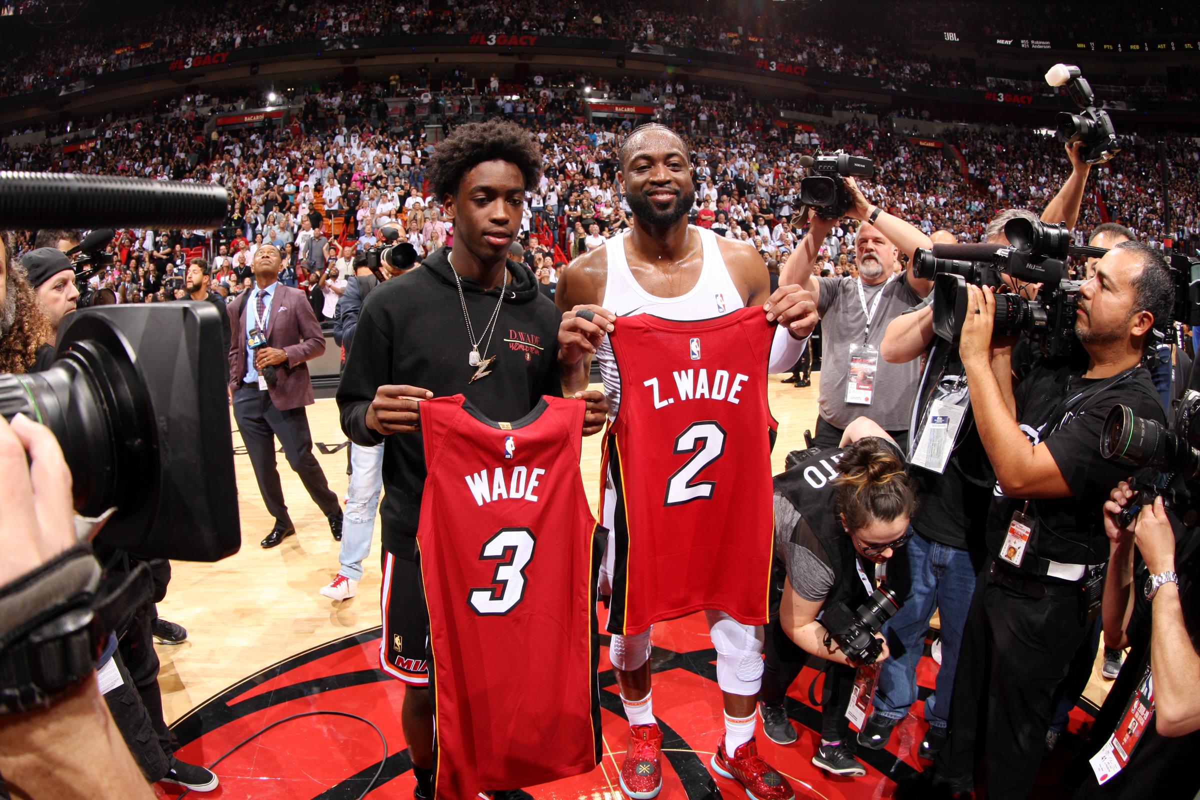 Dwyane Wade #3 of the Miami Heat and son Zaire pose for a photo following the game against the Philadelphia 76ers on April 9, 2019 at American Airlines Arena in Miami, Florida | Source: Getty Images