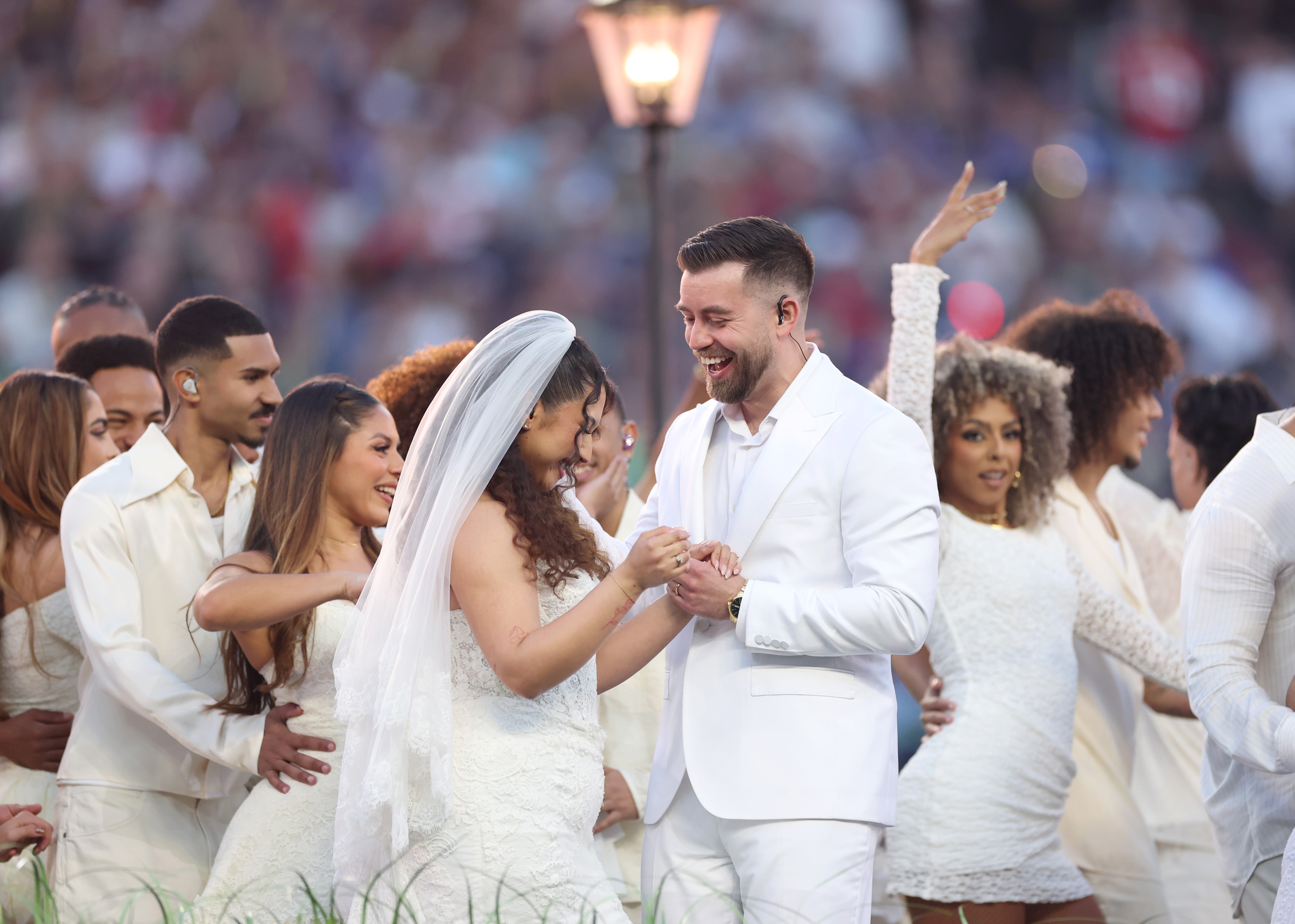 A couple marries during the Bad Bunny performance onstage at the Apple Music Super Bowl LX Halftime Show on February 08, 2026 in Santa Clara, California | Source: Getty Images